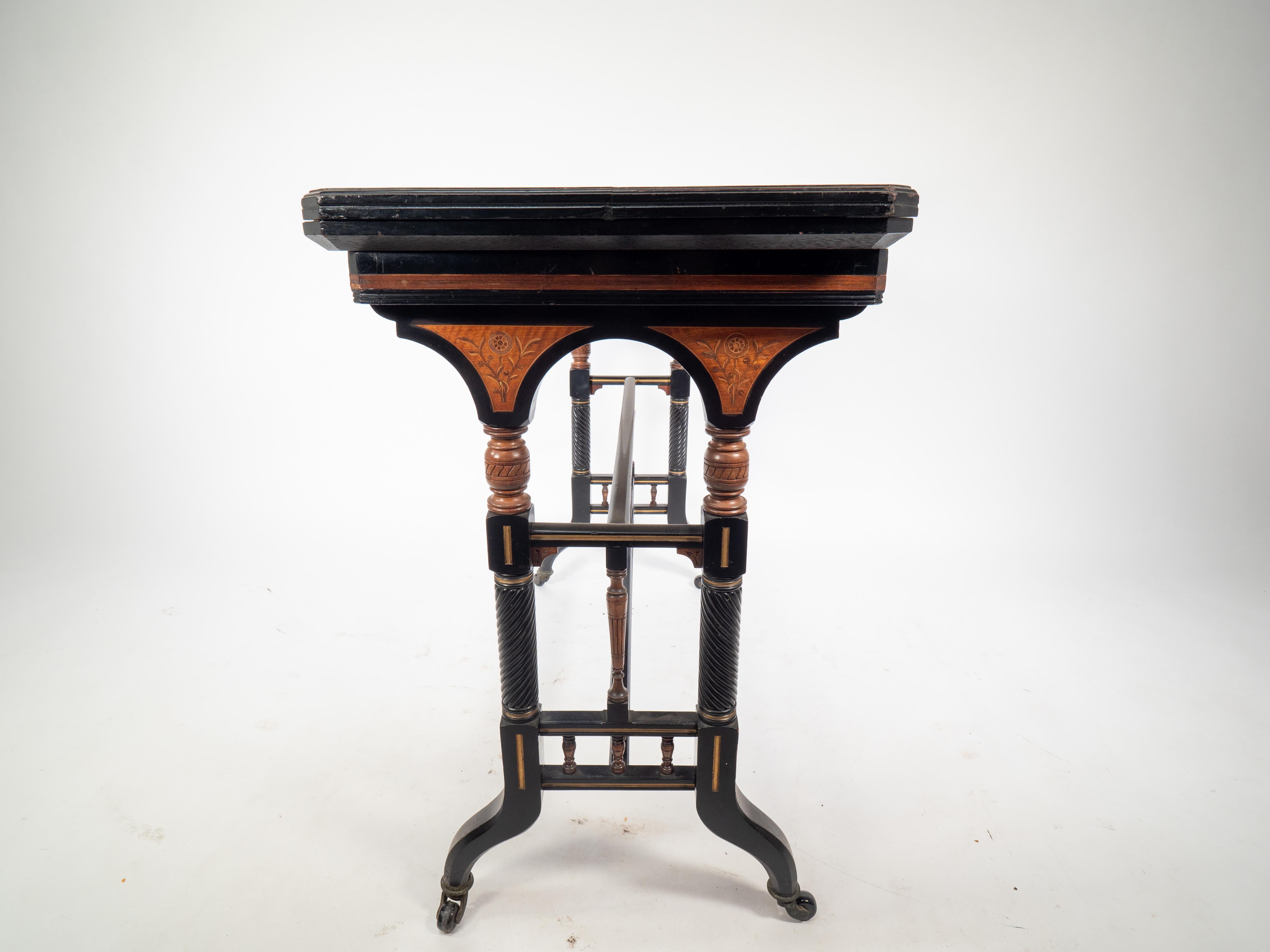 Gillows attr An Aesthetic Movement ebonized & fold over floral inlaid card table For Sale 2