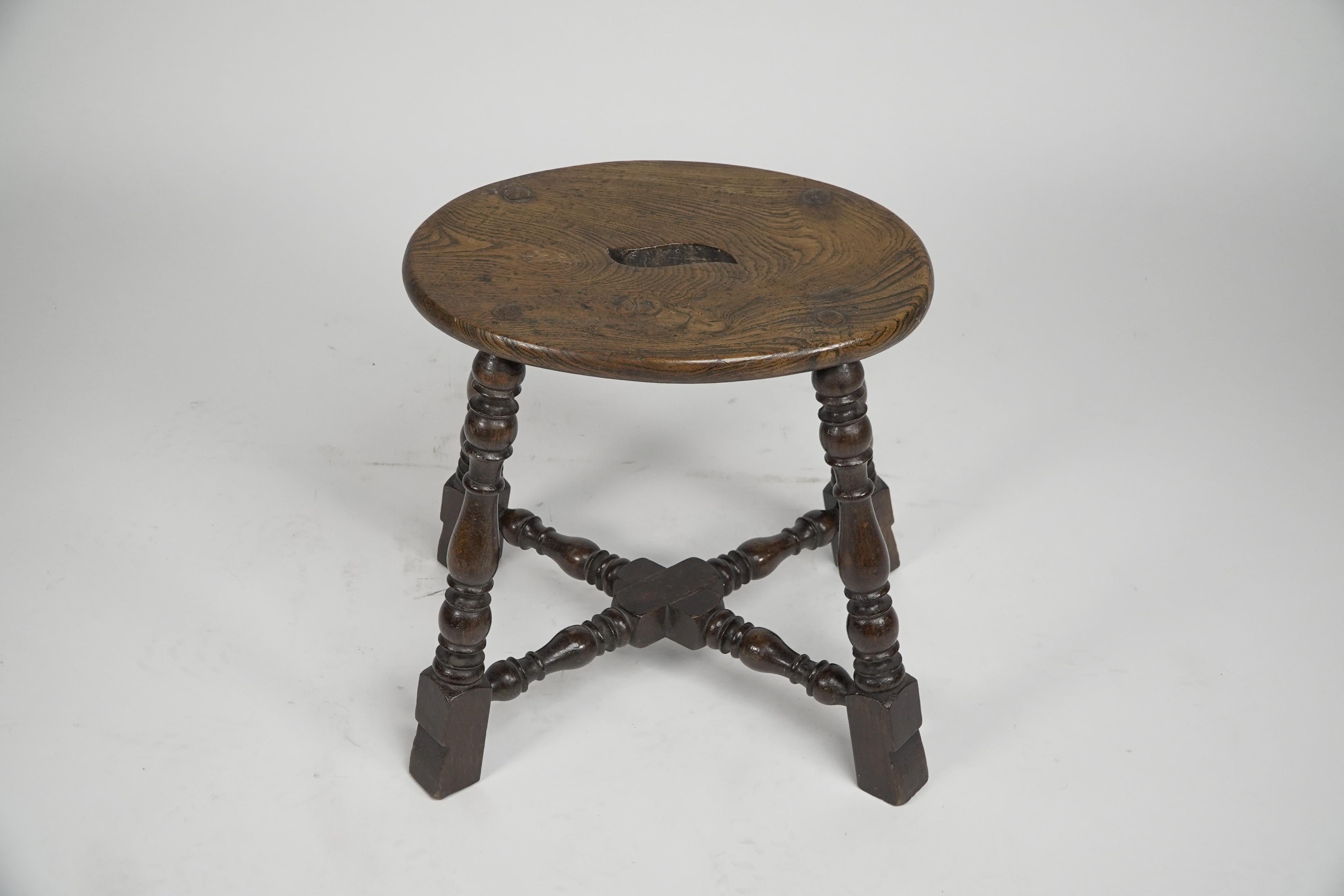 An Aesthetic Movement Elm stool with a 'S' handle, and a wild grain to the seat. For Sale 3