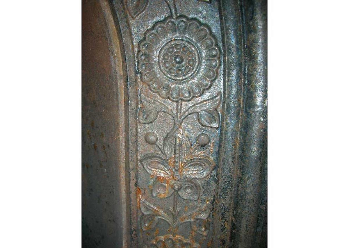 Cast Aesthetic Movement Fireplace with Stylised Dragons & Repeating Sun Flowers