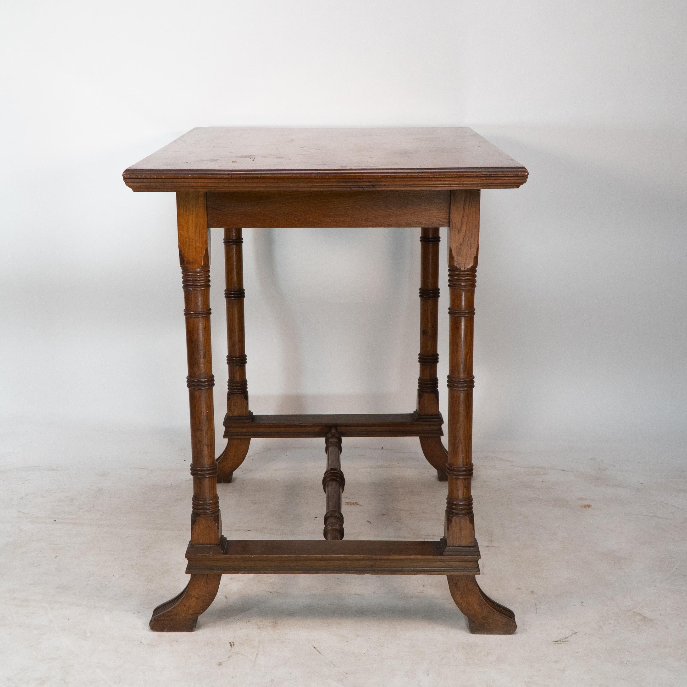English Aesthetic Movement oak oblong side table with ring turned legs, and splayed feet For Sale