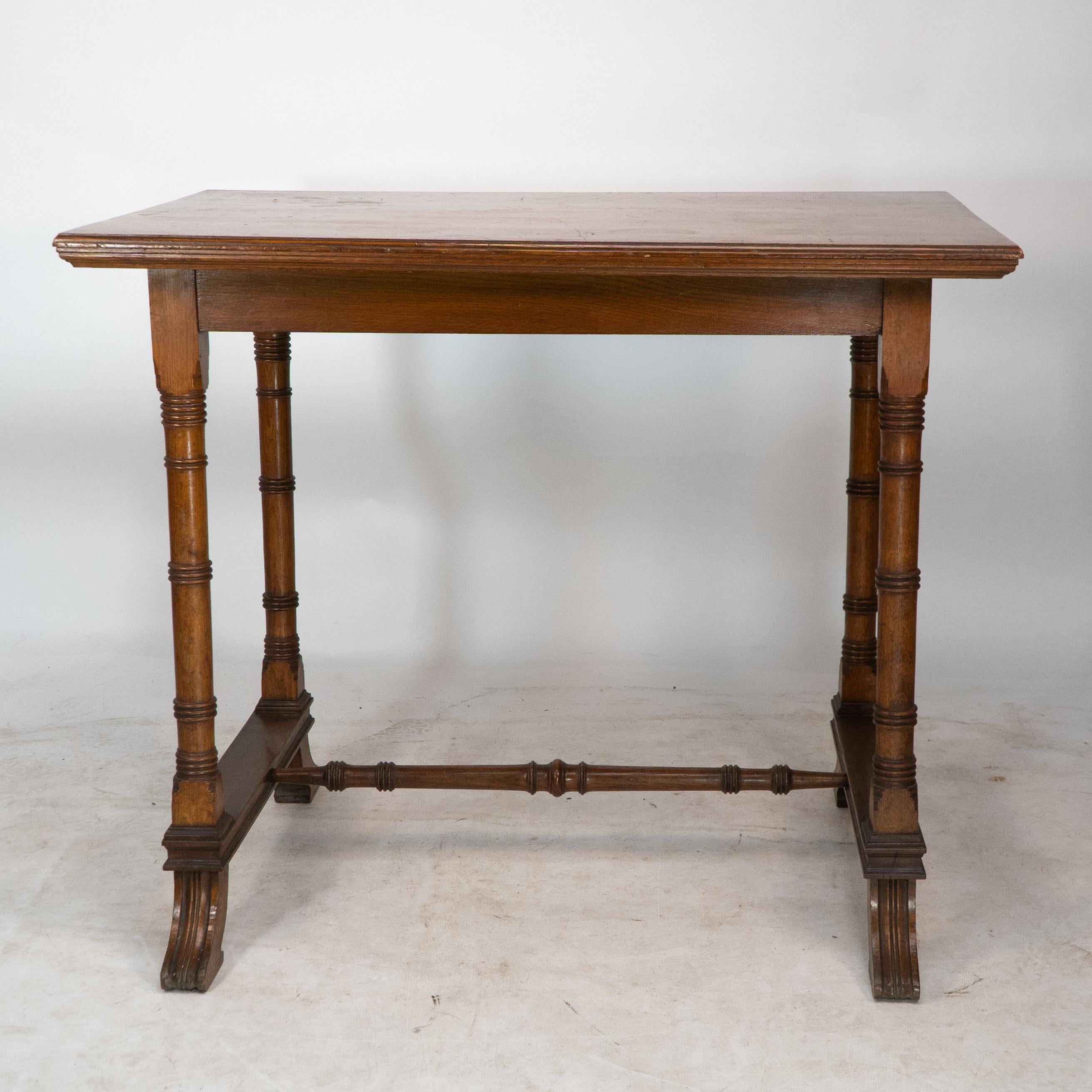 Oak Aesthetic Movement oak oblong side table with ring turned legs, and splayed feet For Sale