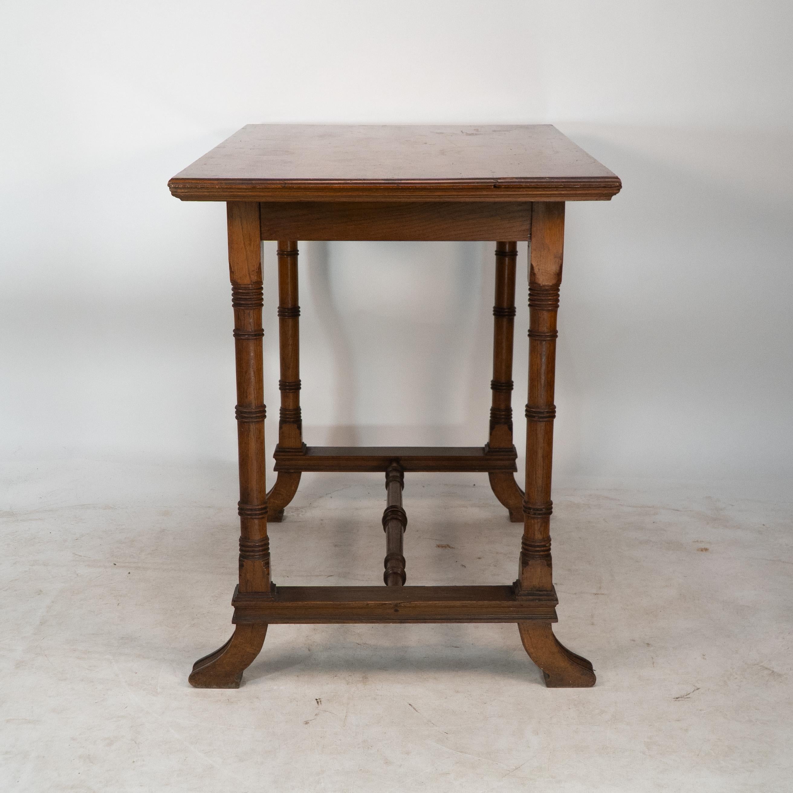 Aesthetic Movement oak oblong side table with ring turned legs, and splayed feet For Sale 1