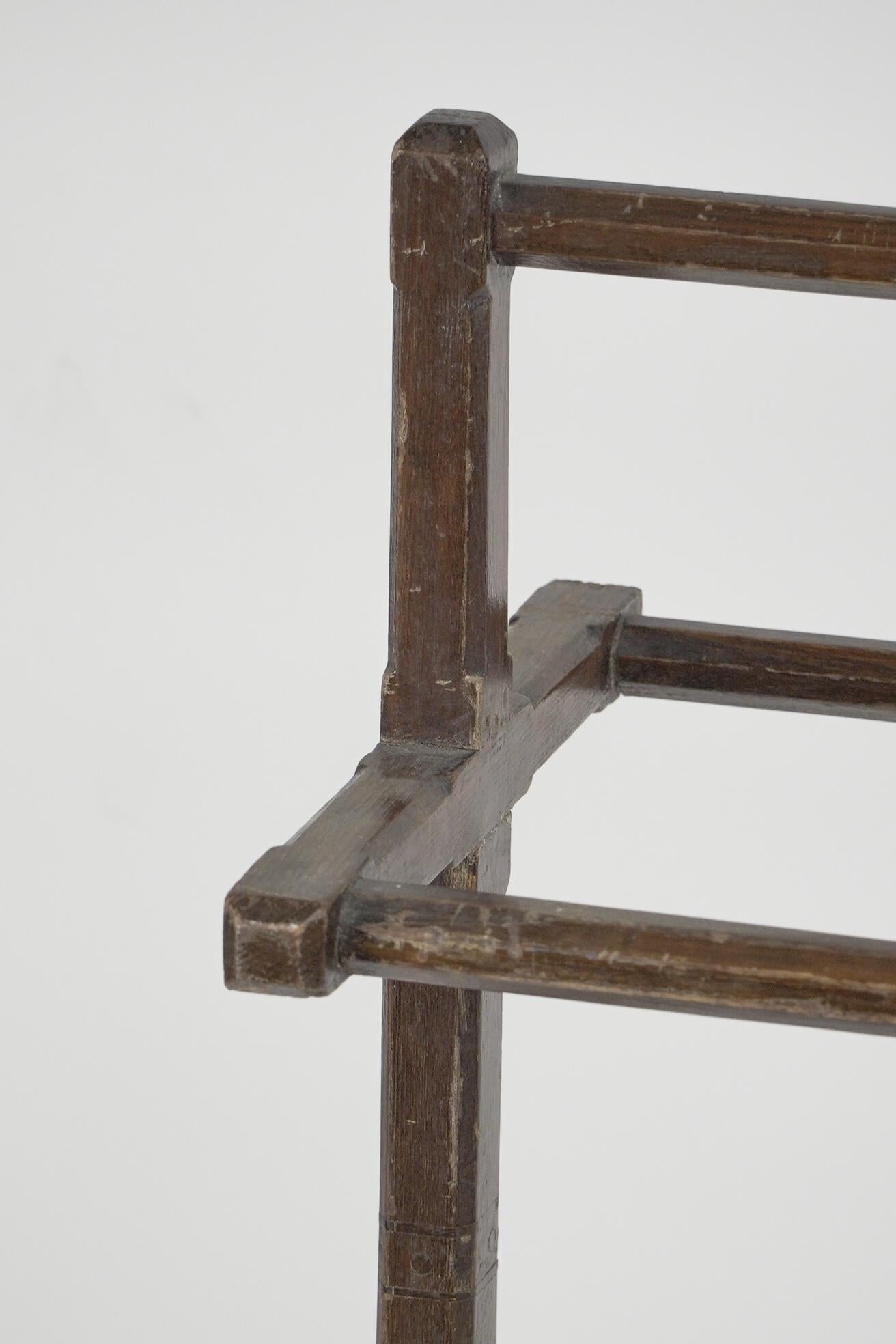 Late 19th Century Charles Bevan attributed. An Aesthetic Movement oak towel rail with fine details For Sale