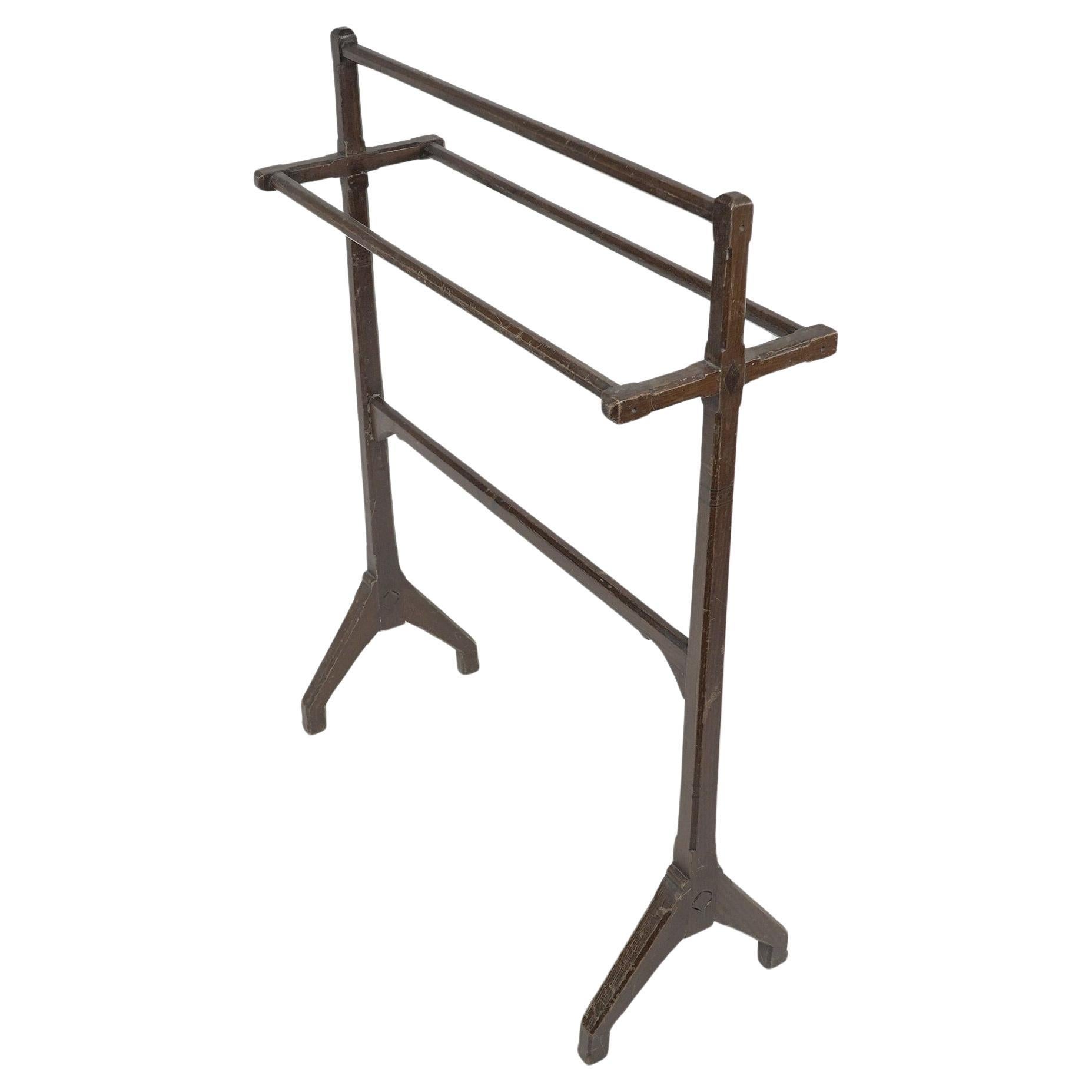 Charles Bevan attributed. An Aesthetic Movement oak towel rail with fine details
