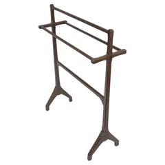 Antique Charles Bevan attributed. An Aesthetic Movement oak towel rail with fine details