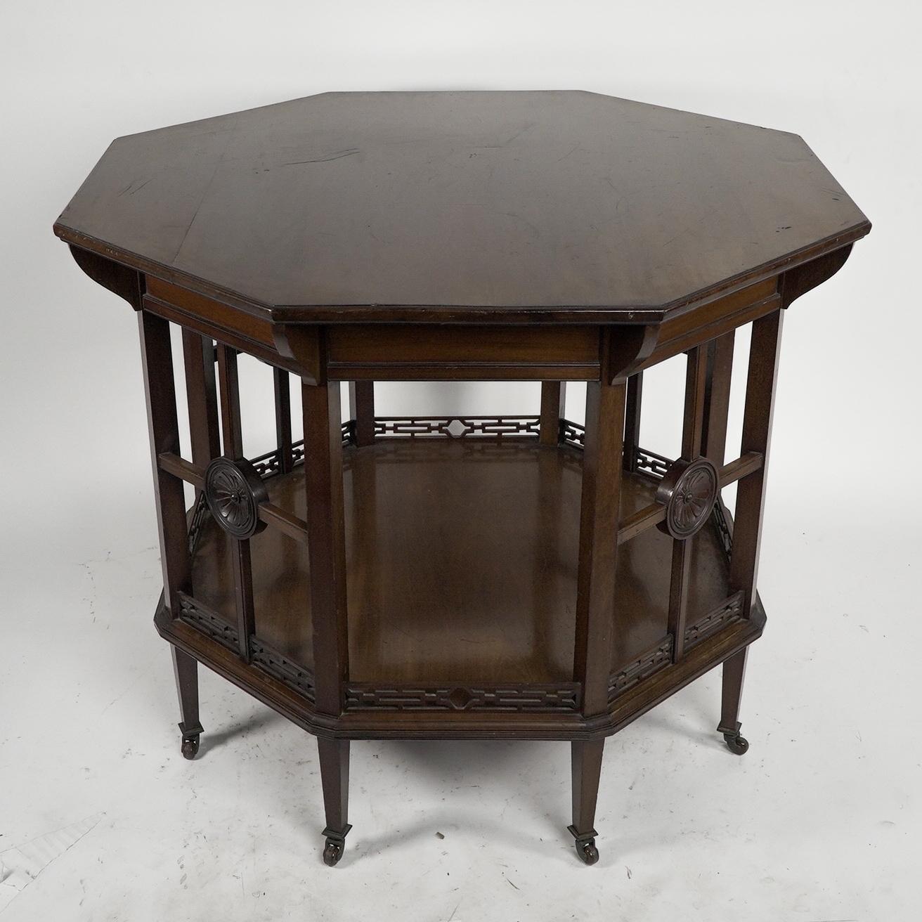 English Gillows attr, An Aesthetic Movement octagonal walnut eight leg centre table For Sale