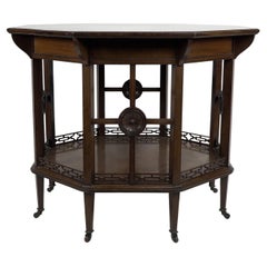 Antique Gillows attr, An Aesthetic Movement octagonal walnut eight leg centre table