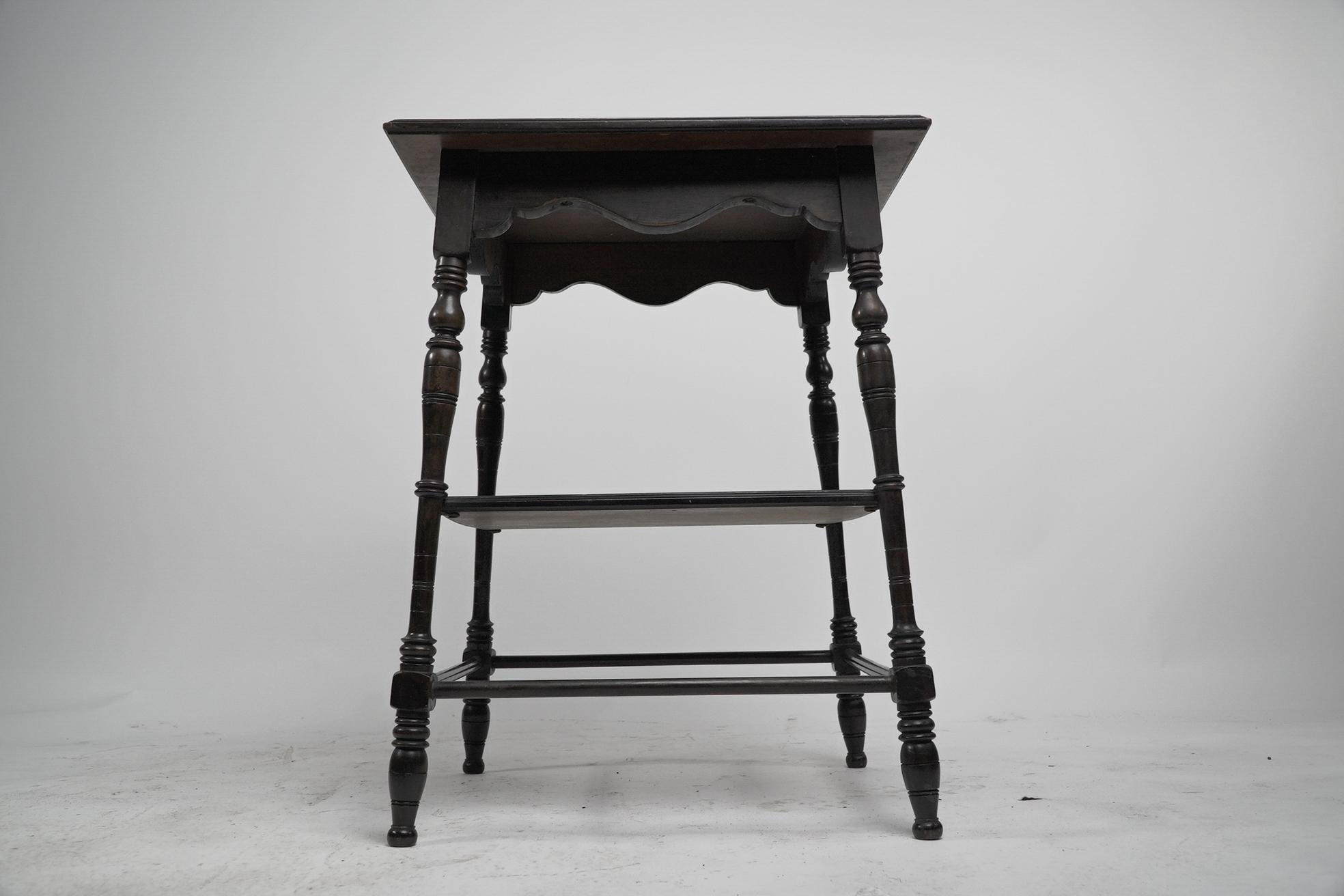 Late 19th Century An Aesthetic Movement rosewood two tier side table inlaid with floral decoration For Sale