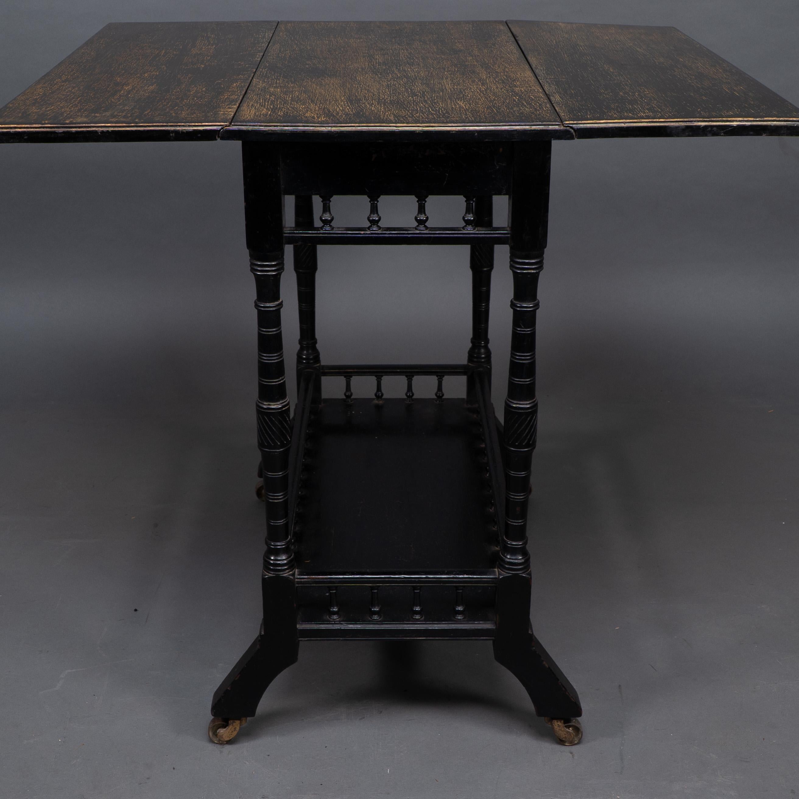 An Aesthetic Movement walnut drop leaf side table on four turned & incised legs For Sale 4