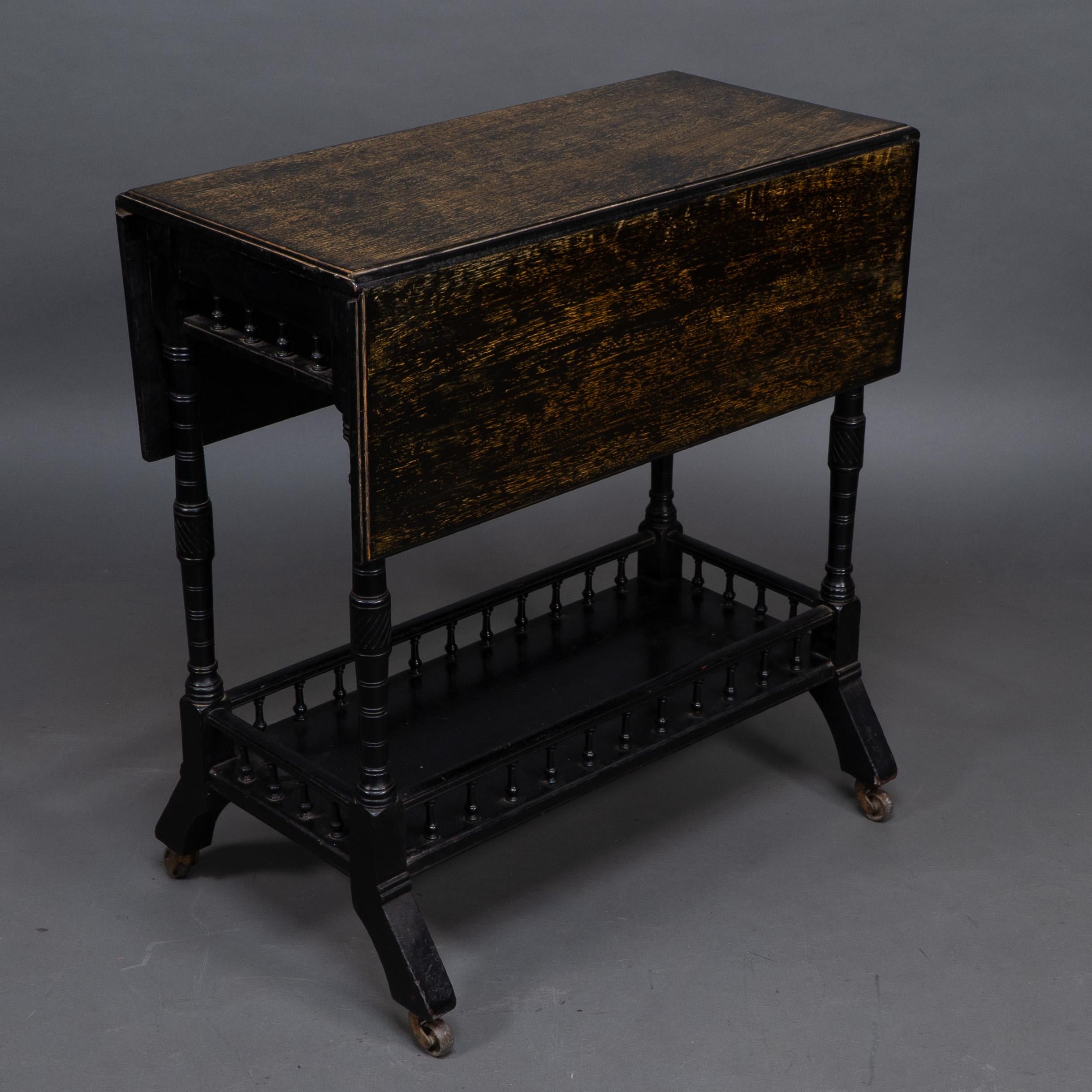 English An Aesthetic Movement walnut drop leaf side table on four turned & incised legs For Sale