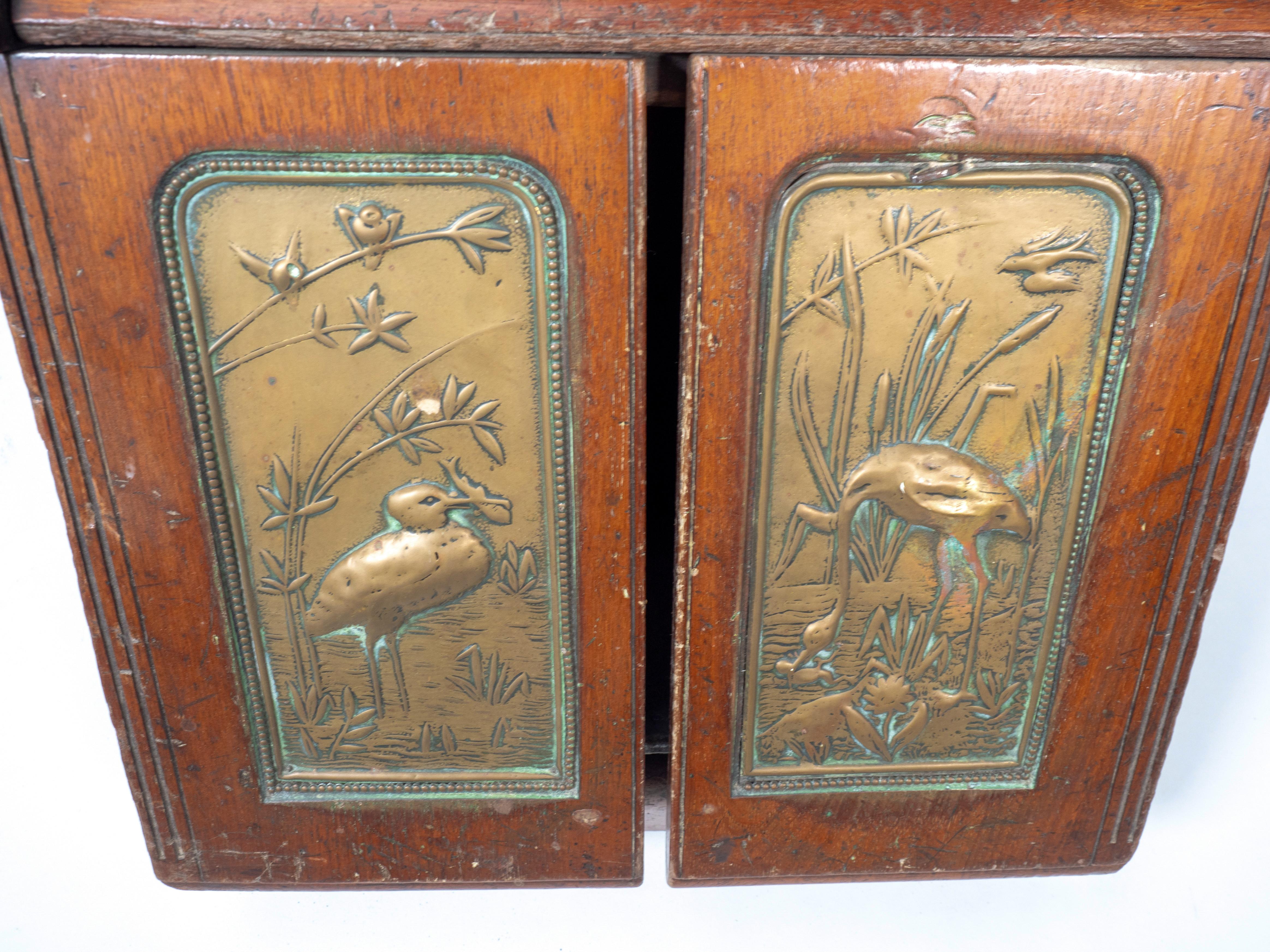 Aesthetic Movement walnut metamorphic oak coal box with Herons in a river scene. For Sale 4