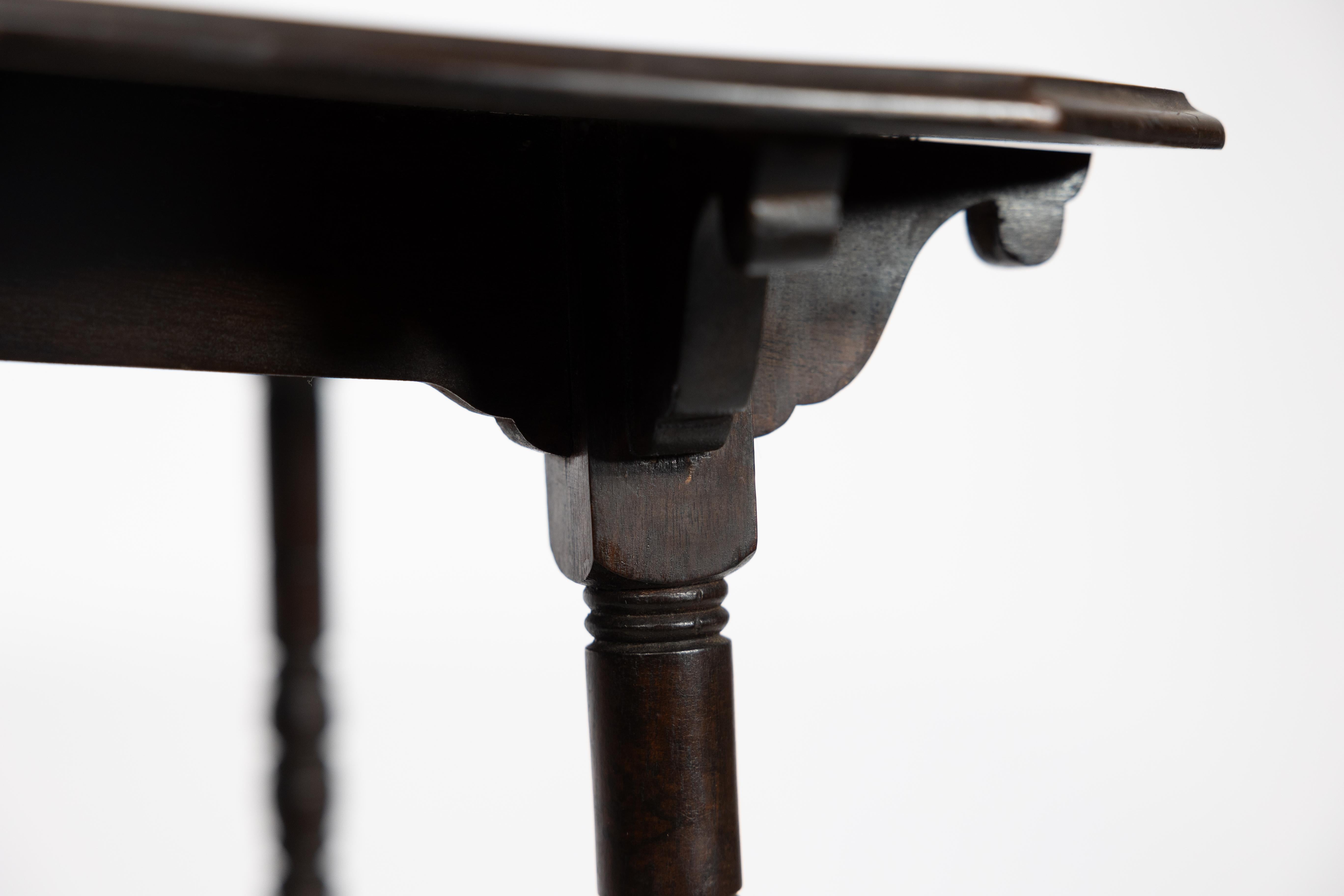 An Aesthetic Movement walnut two-tier side table with canted corners For Sale 6
