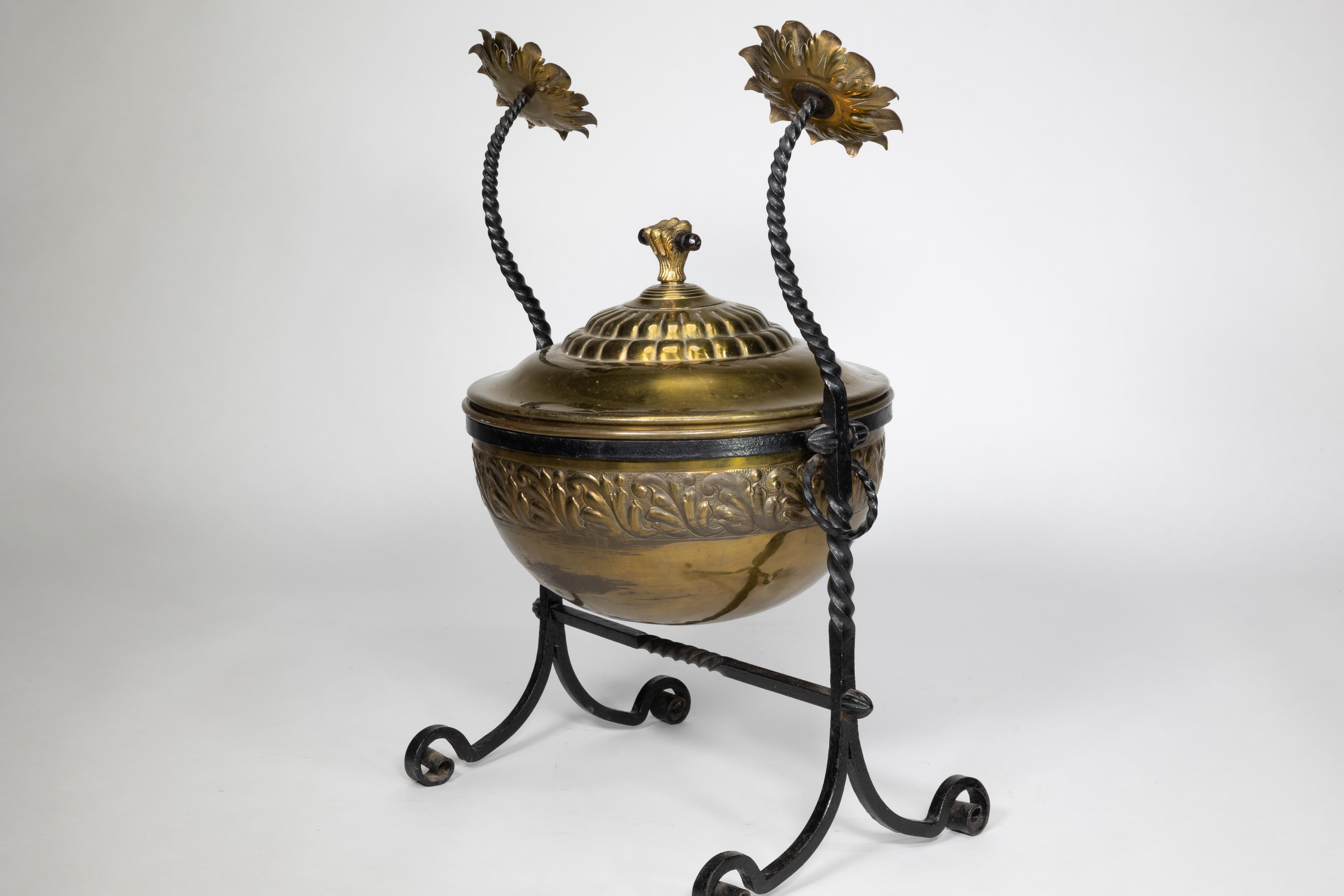 Wrought Iron An Aesthetic Movement wrought iron and copper fire bucket with sunflower finials For Sale
