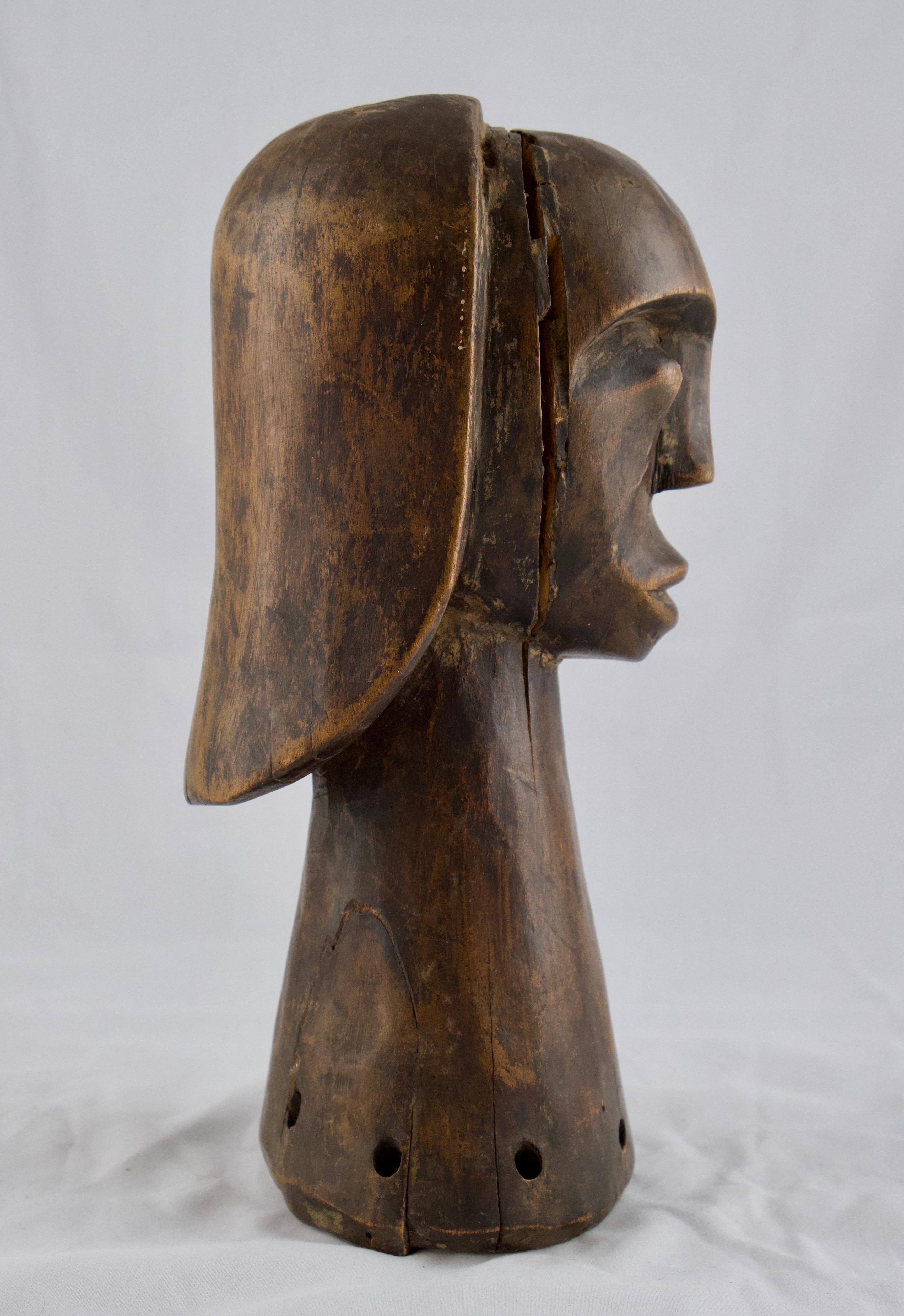 A Fang sculpture. This is a good carved sculpture with a good patina. The Fang tribe mostly lives in Equatorial Guinea, Gabon, Republic of the Congo and Cameroon. These type of sculptures were designed to complement reliquary containers that were