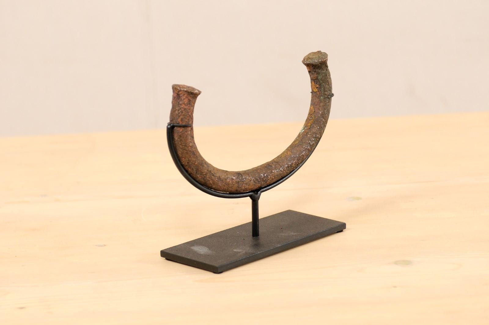 Nigerian An African Manilla Trade Currency on Custom Iron Stand