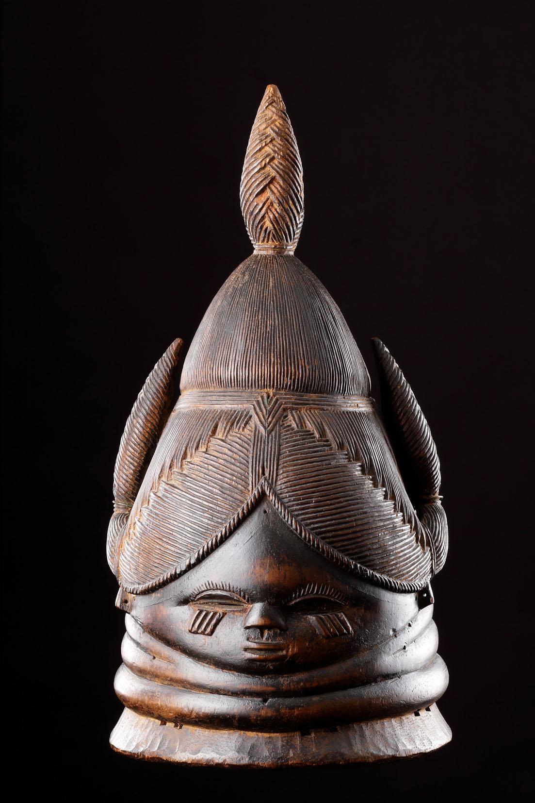An African ‘Sande’ or ‘Bundu’ Mask
Attributed to the Sogande (or Su Gande) workshop, Kenema
Rich dark brown, ‘treacly’ overall patina
Wood
Mende Sierra Leone / Liberia
20th Century

Size: 45cm high - 17¾ ins high

Ex Private London