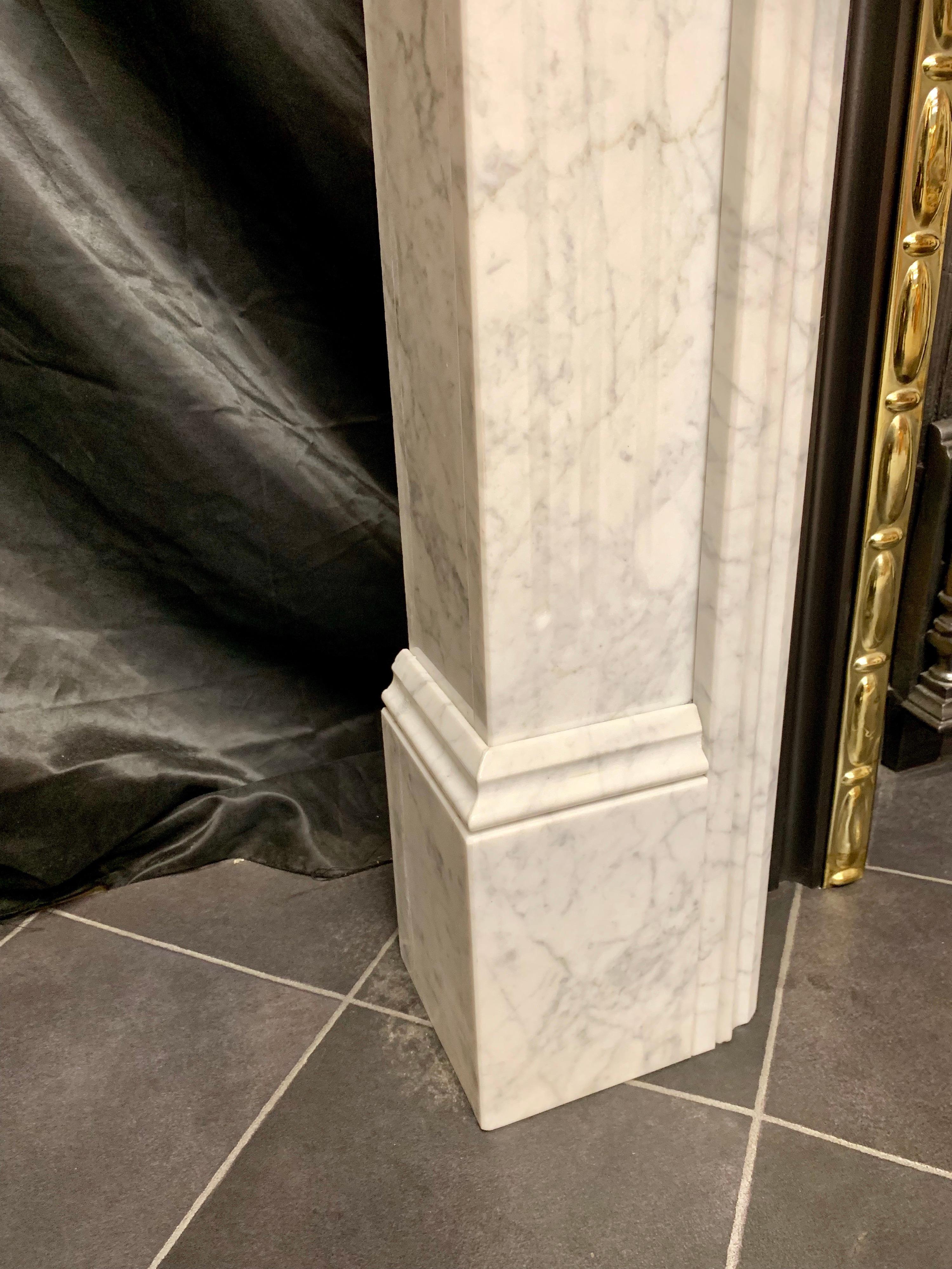 Mid-20th Century Aged Victorian Style Carved Carrara Marble Fireplace Surround For Sale