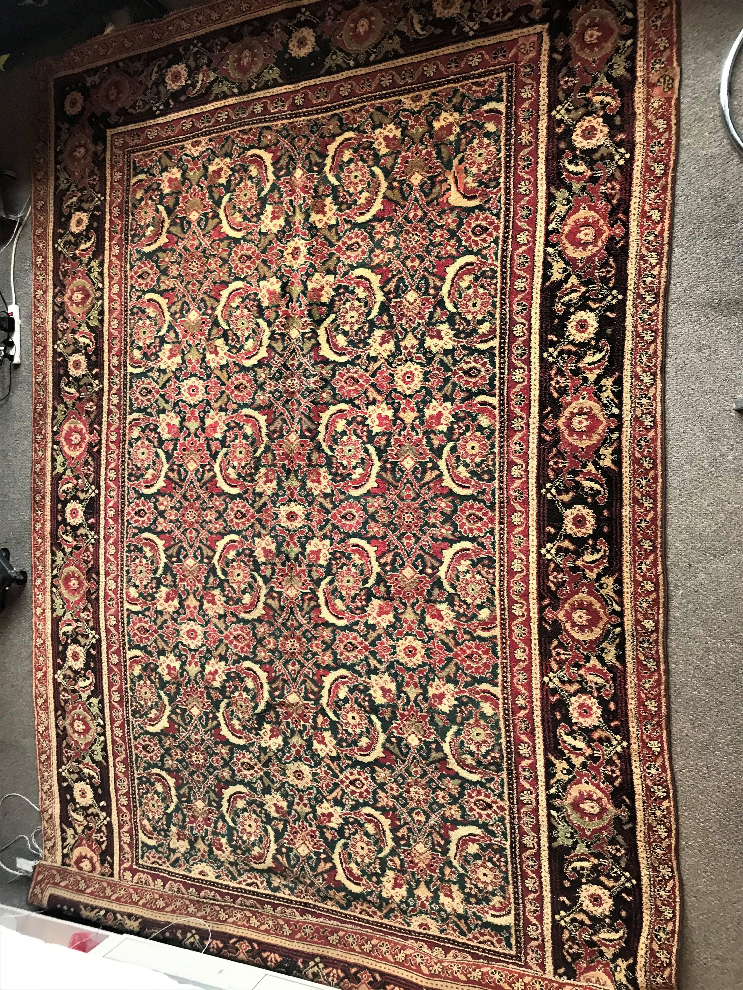 A finely knotted carpet made in Arga during the late 19th century. This carpet, in nice condition having just been cleaned and hung. The vibrant burgundy, reds, blue and black colors will make this wonderful piece of art flow into any room in the