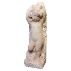 An alabaster relief memorial figure