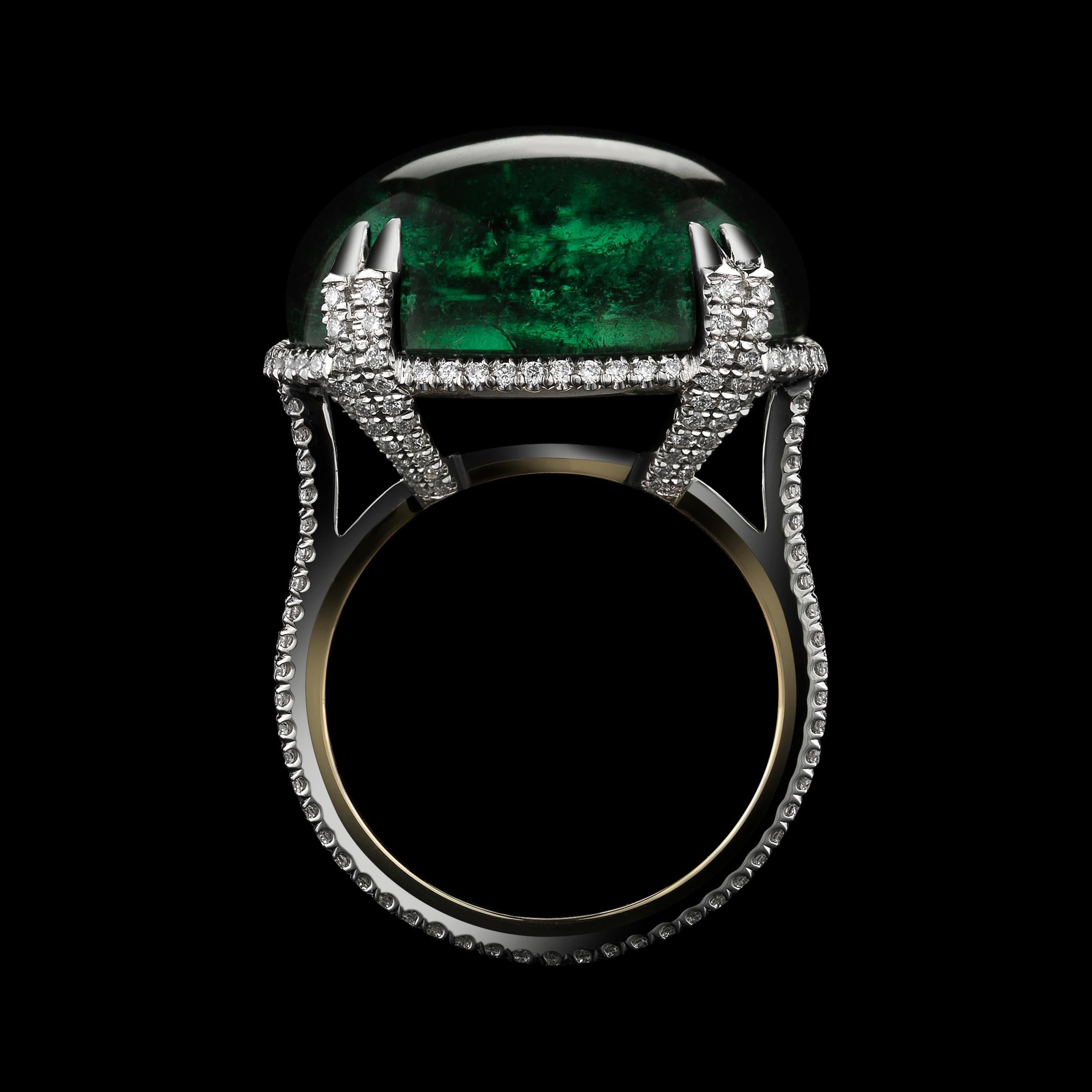 This One-of-A-Kind Alexandra Mor ring features a 23.39-carat Cabochon Green Tourmaline set with Alexandra Mor's signature floating Diamond melee and knife-edged wire. The ring is set in platinum on 18 karats yellow gold Alexandra Mor logo gallery.