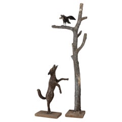 An Allegorical Sculpture of a Dog and A Crow on a Tree