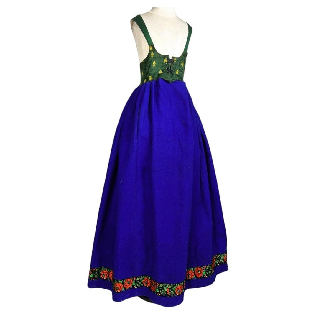An Alsatian dress in blue woolen cloth with a silk corset, circa 1900–1920