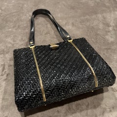 An Amazing 1960s Black Woven Wicker and Brass Italian Hand Bag
