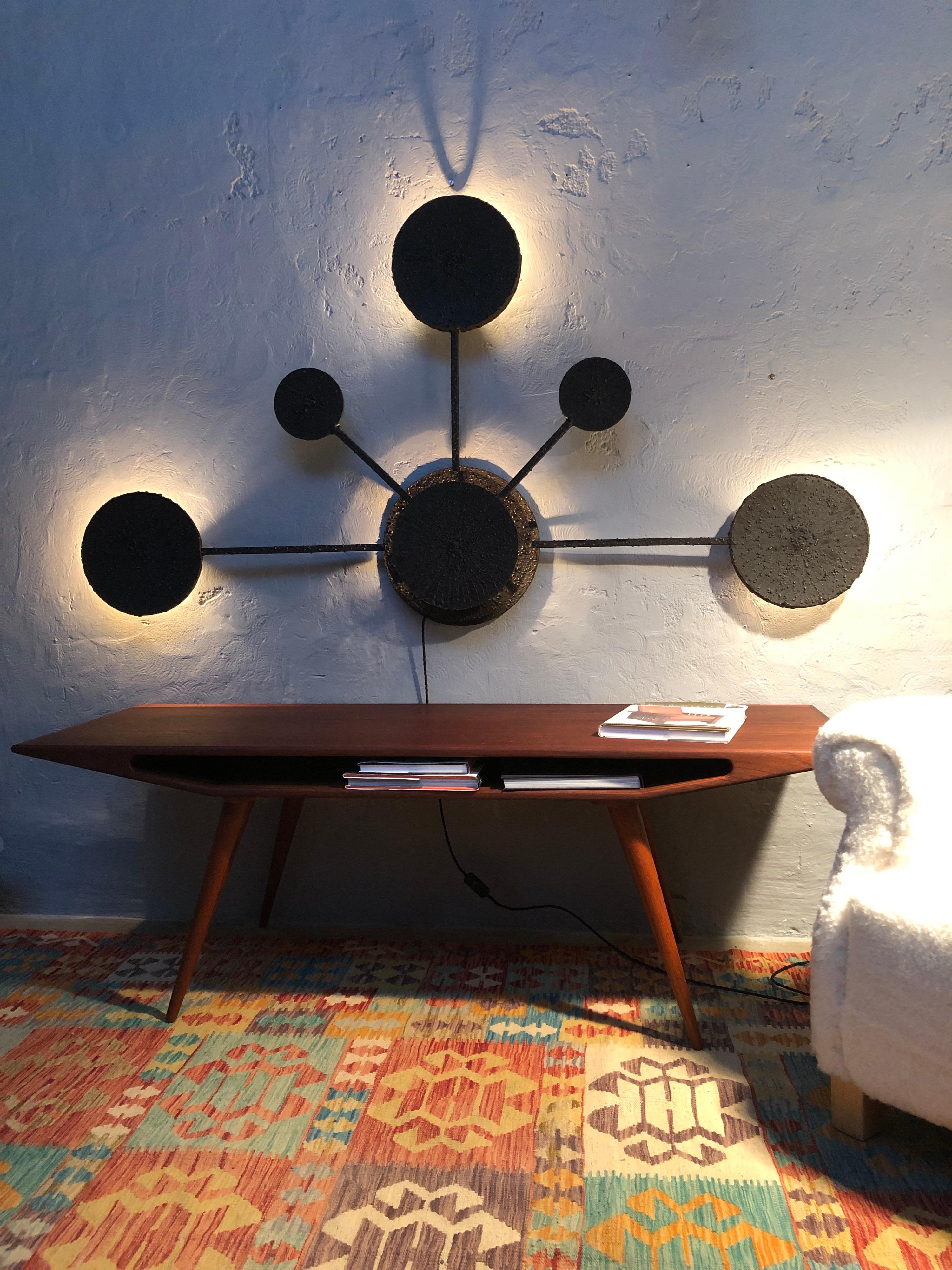 An amazing large and impressive brutalist wall sculpture lamp from the 1960s. 
Made from torch cut steel with 4 lamp outlets in size E14. 
Rewired and grounded. 
Can be used with incandescent or led bulbs. 
Great patina to the surface of the