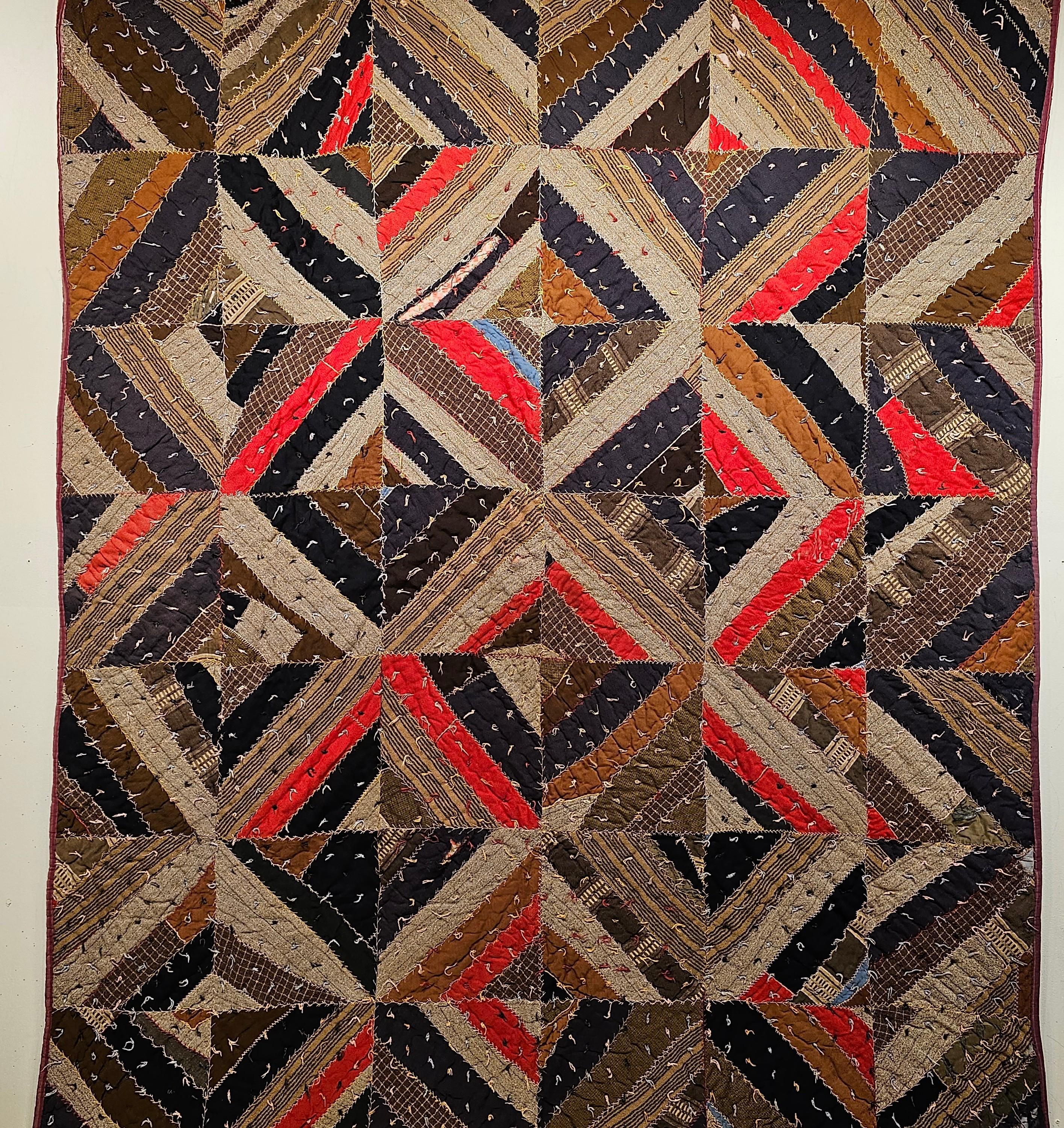 An American Civil War era African American Southern quilt circa the 1860-1870s from Alabama or Georgia in the American deep south.  The quilt is hand stitched from wool and homespun blankets.   The design consists of squares of diagonally stitched
