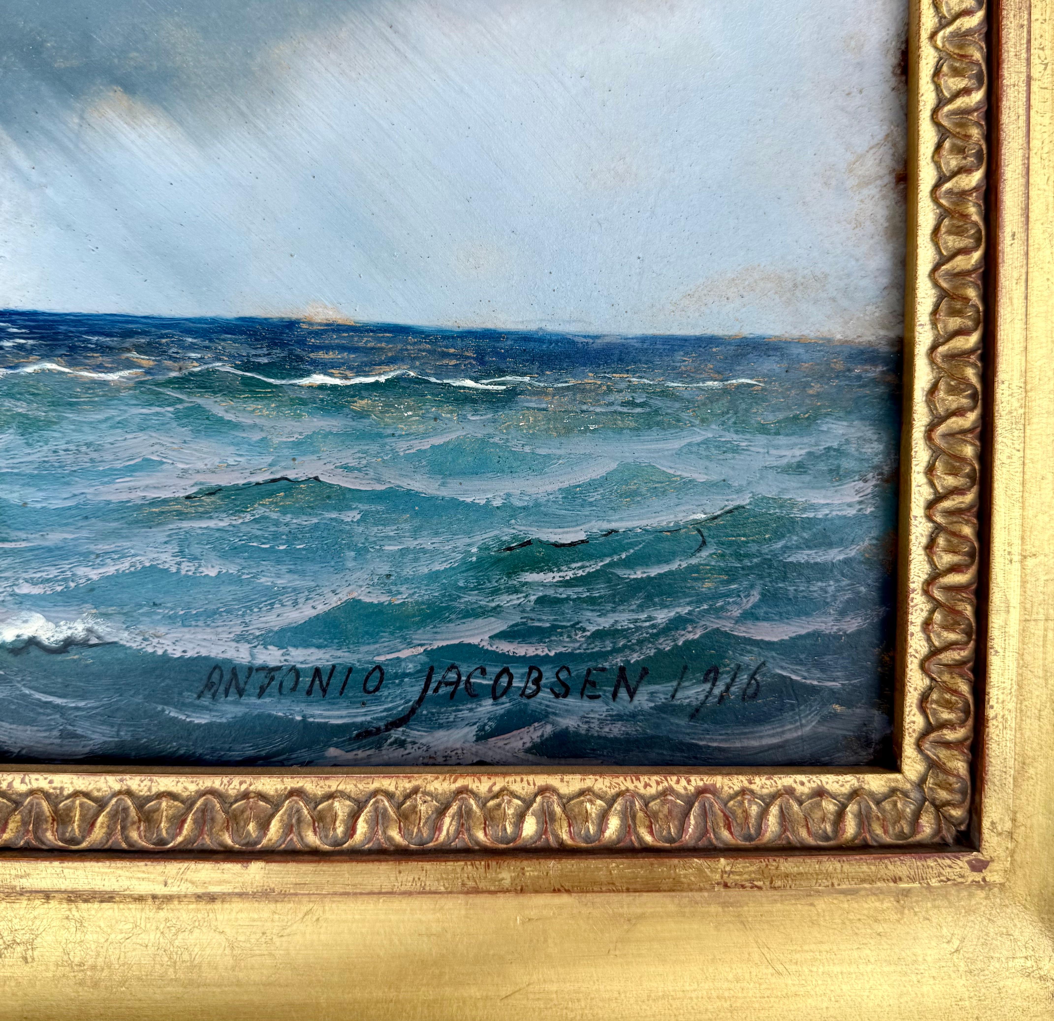 An oil on artist board featuring an American clipper ship by Antonio Jacobsen.  Signed and dated 1916 in the lower right corner.  Measuring 23.5