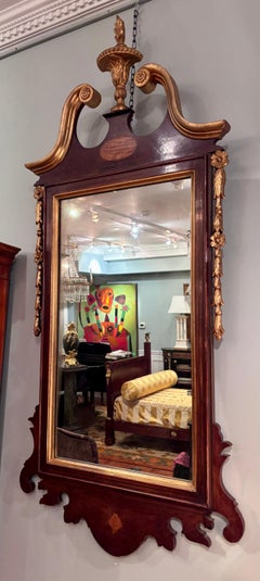 An American Colonial Revival Walnut and Gilt Wood Mirror