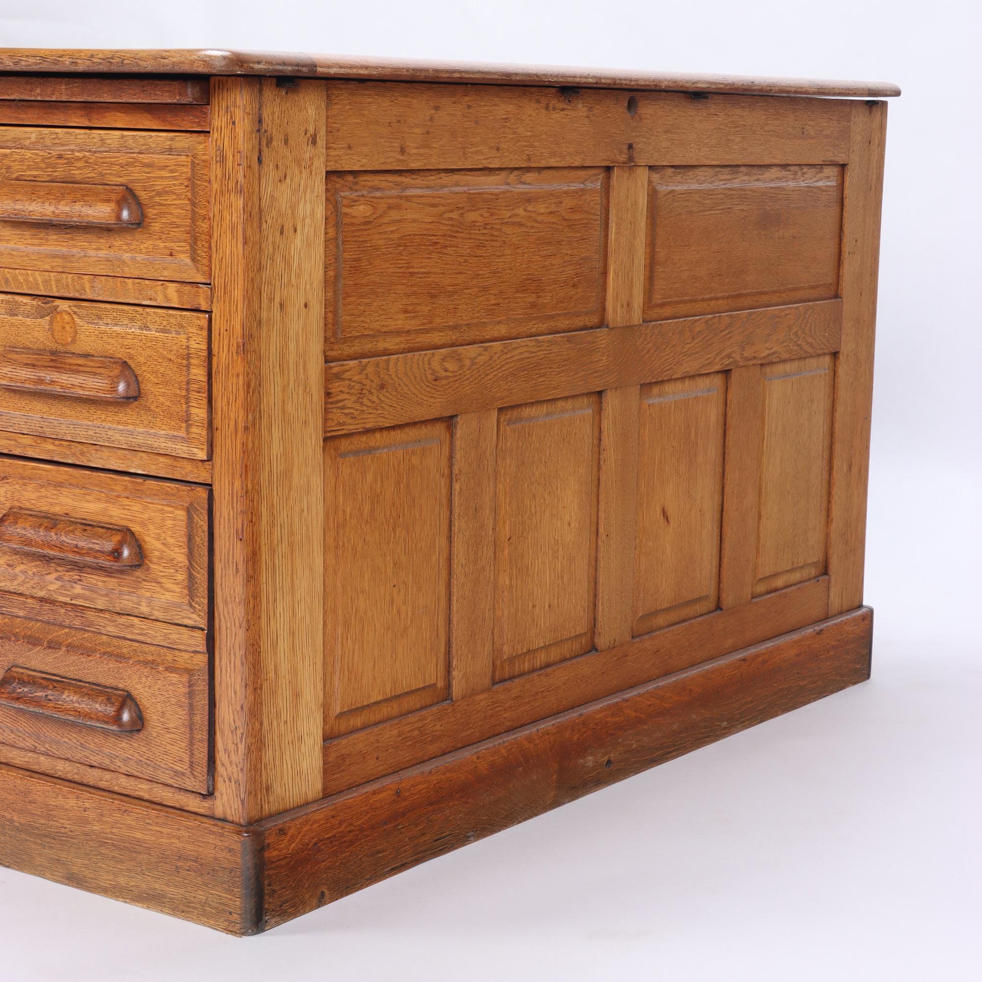 An American oak raised panel partners desk circa 1900.