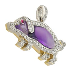An amethyst and diamond pig pendant