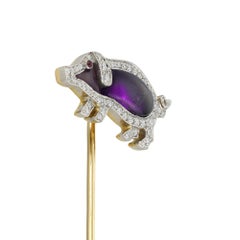 An amethyst and diamond pig stick pin