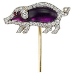 An amethyst and diamond pig stick pin