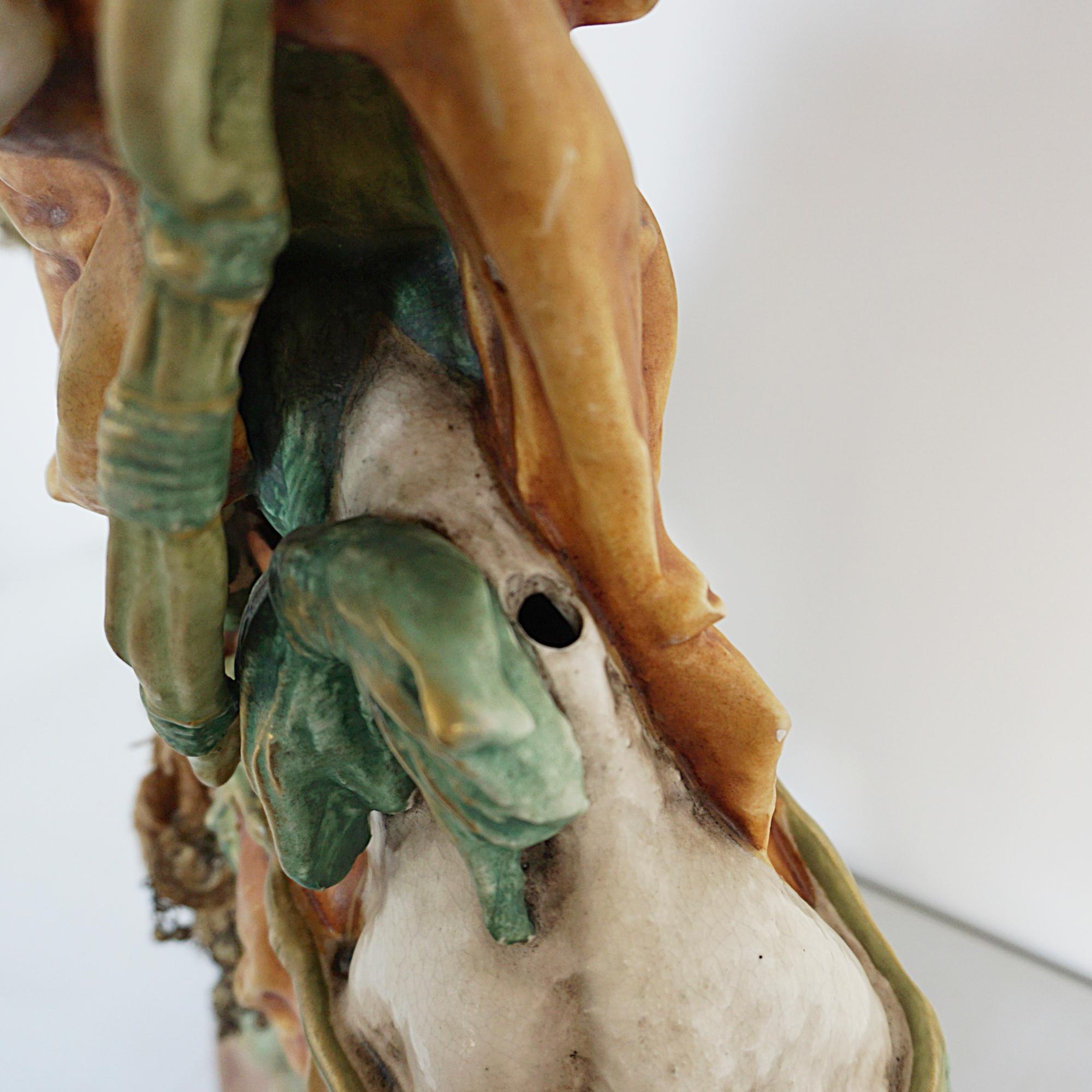 An Amphora Glazed Pottery Figure of a Camel and Rider 6