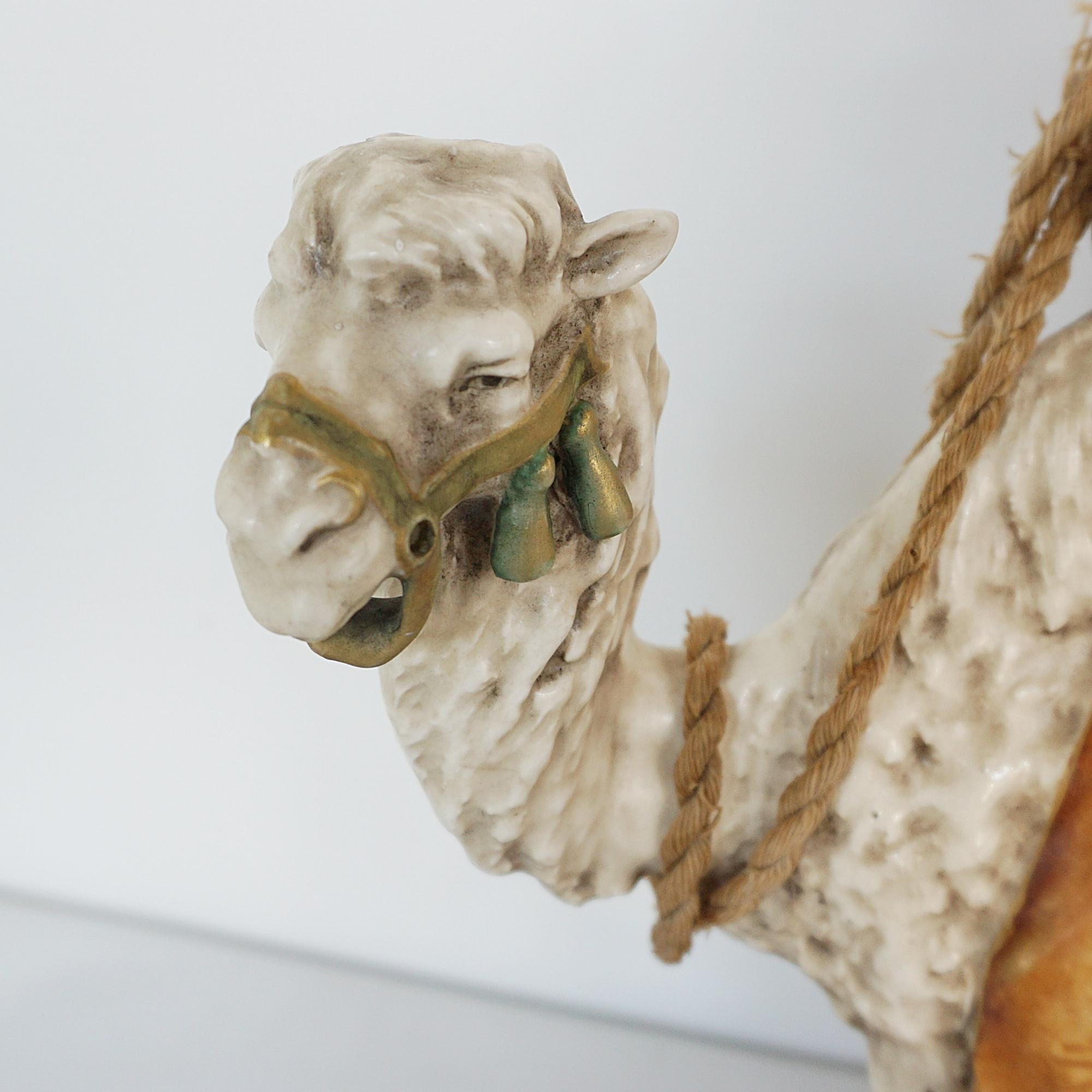 An Amphora Glazed Pottery Figure of a Camel and Rider 3