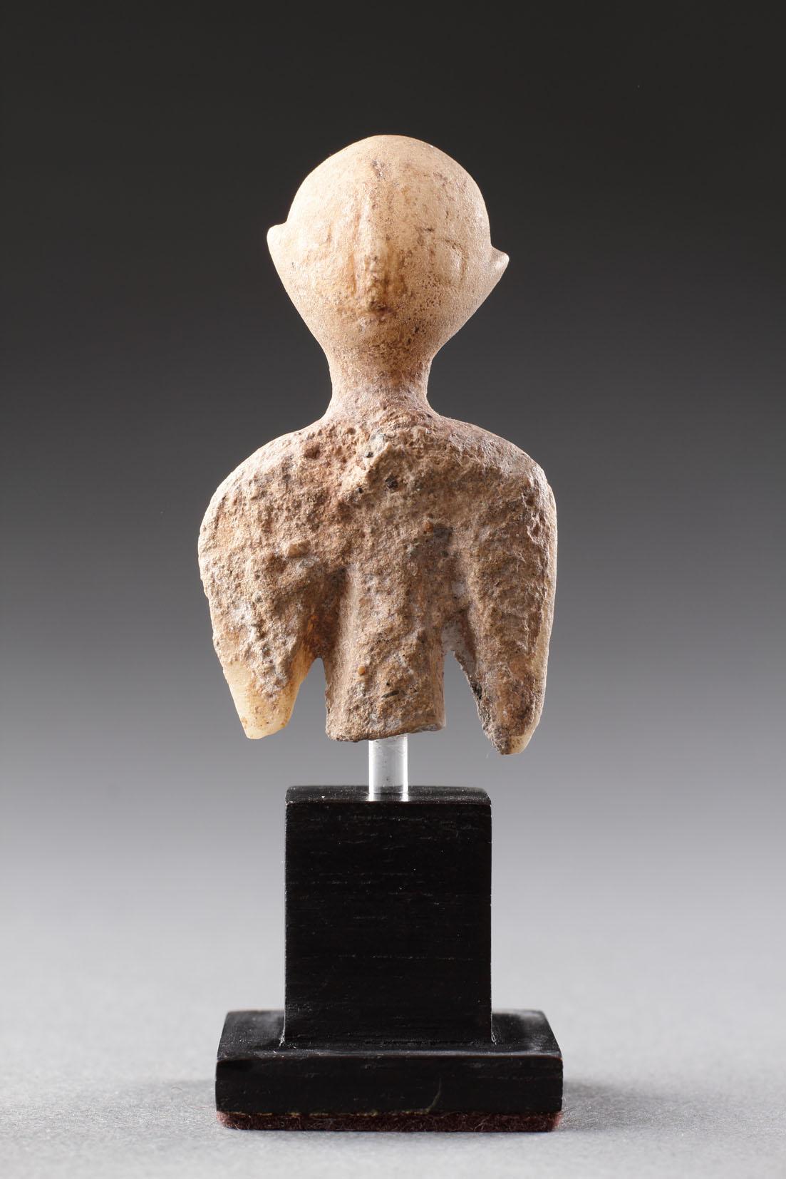 An Anatolian Marble ‘Star Gazer’ Figure
Marble
Anatolian
Early Bronze Age / Circa 2700 - 2100 BC

Size: 5cm high, 3cm wide - 2 ins high, 1¼ ins high

The highly stylised oval head with two small ears and long nasal ridge leans slightly back. A short
