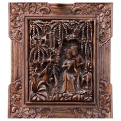 Ancient Carving of Exotic Wood Representing Two Lovers Hidden Among the Trees