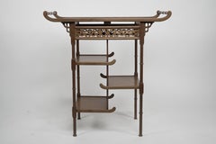 An Anglo-Japanese beech wood side table with fretwork &pagoda style turned rails
