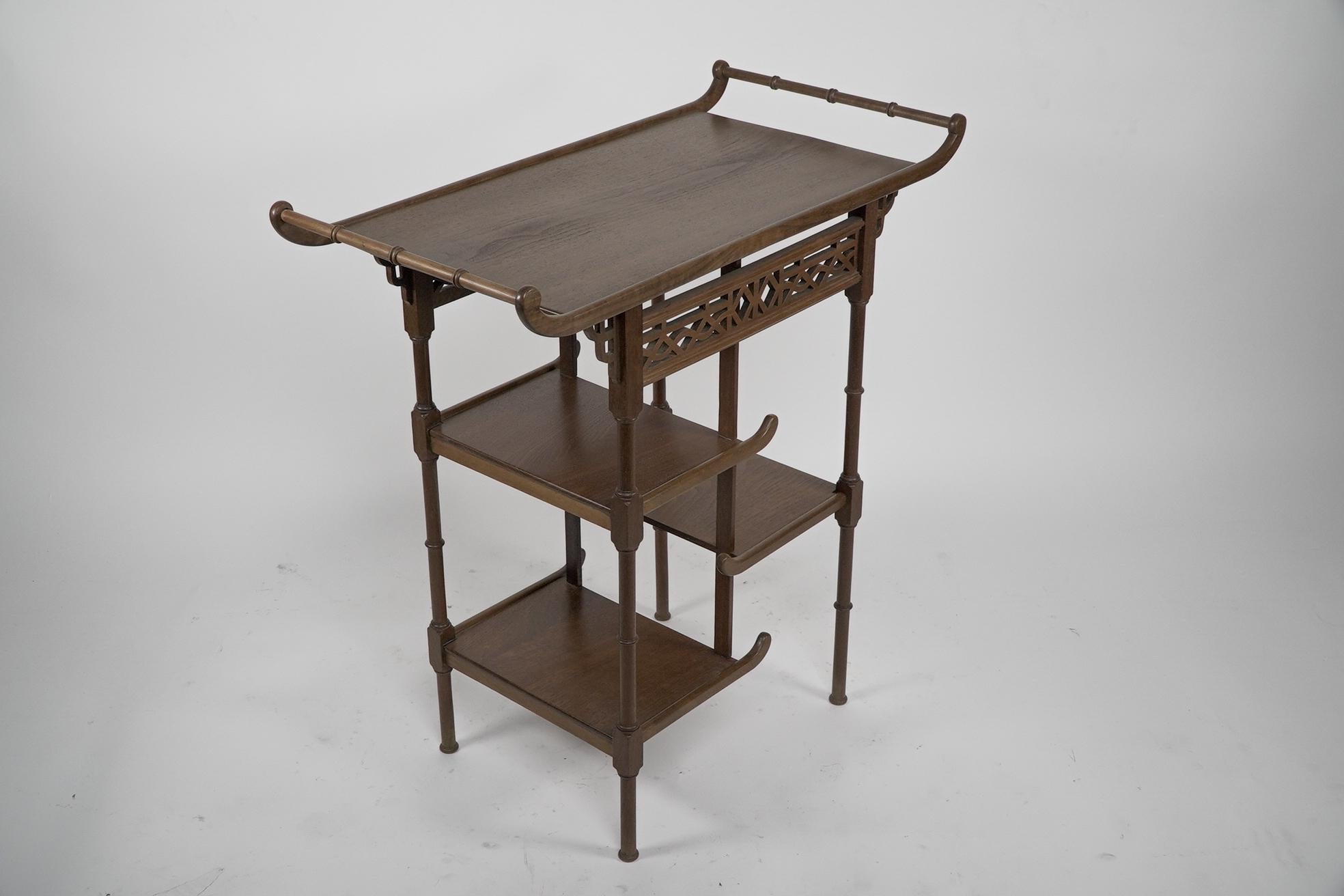 English An Anglo-Japanese beech wood side table with fretwork &pagoda style turned rails For Sale