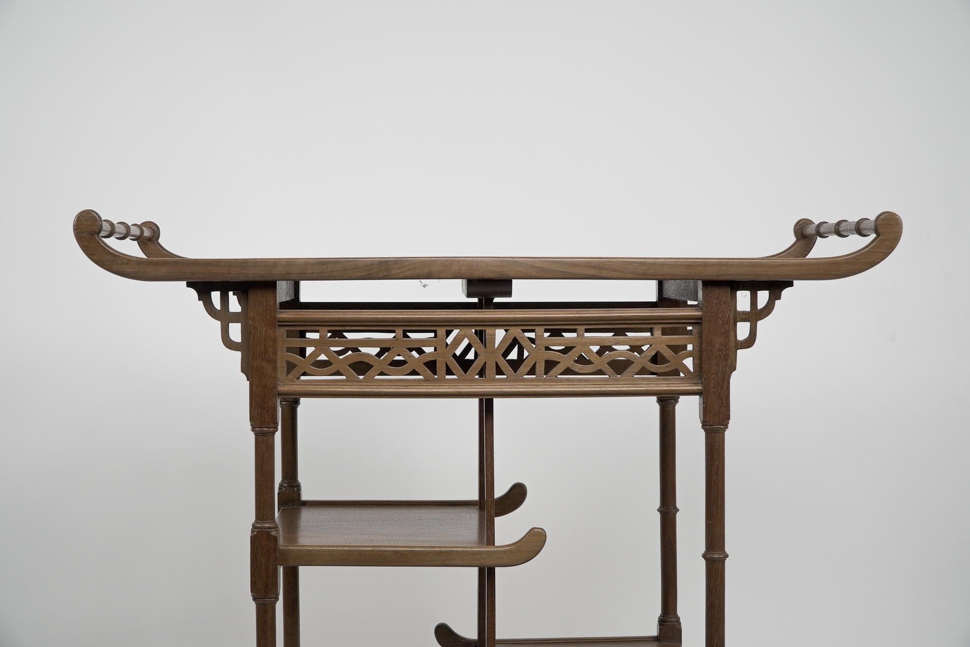 Beech An Anglo-Japanese beech wood side table with fretwork &pagoda style turned rails For Sale