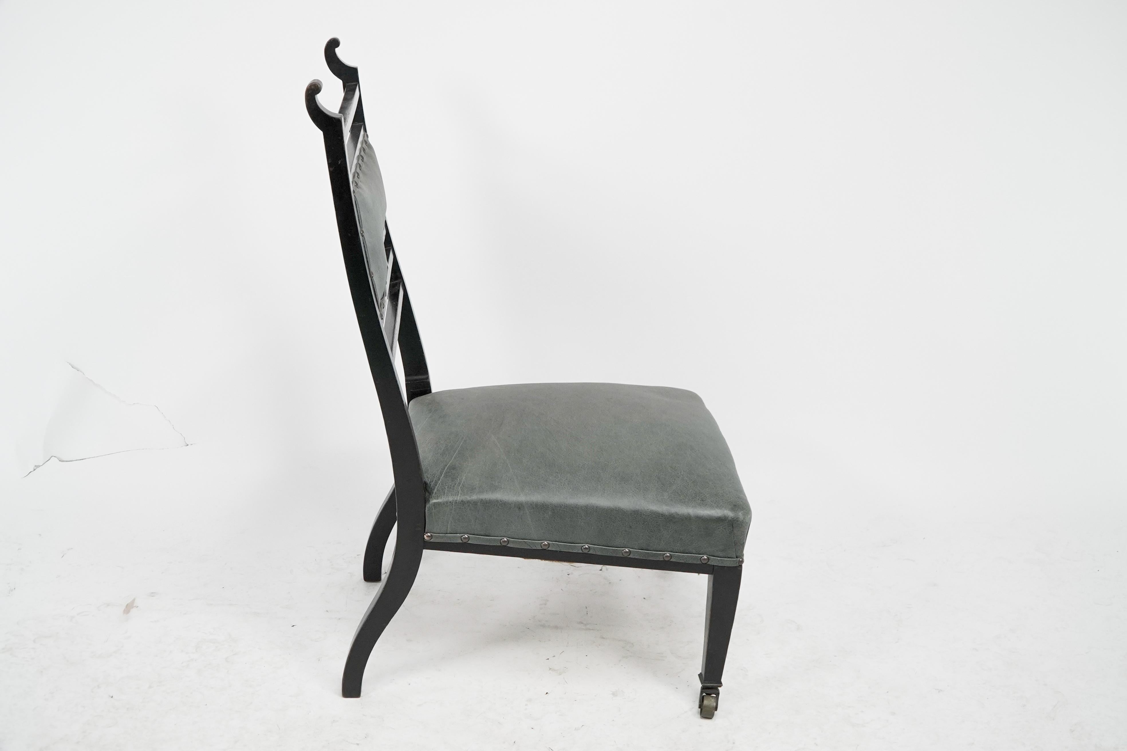 An Anglo-Japanese ebonized side or nursing chair with green hide upholstery In Good Condition For Sale In London, GB