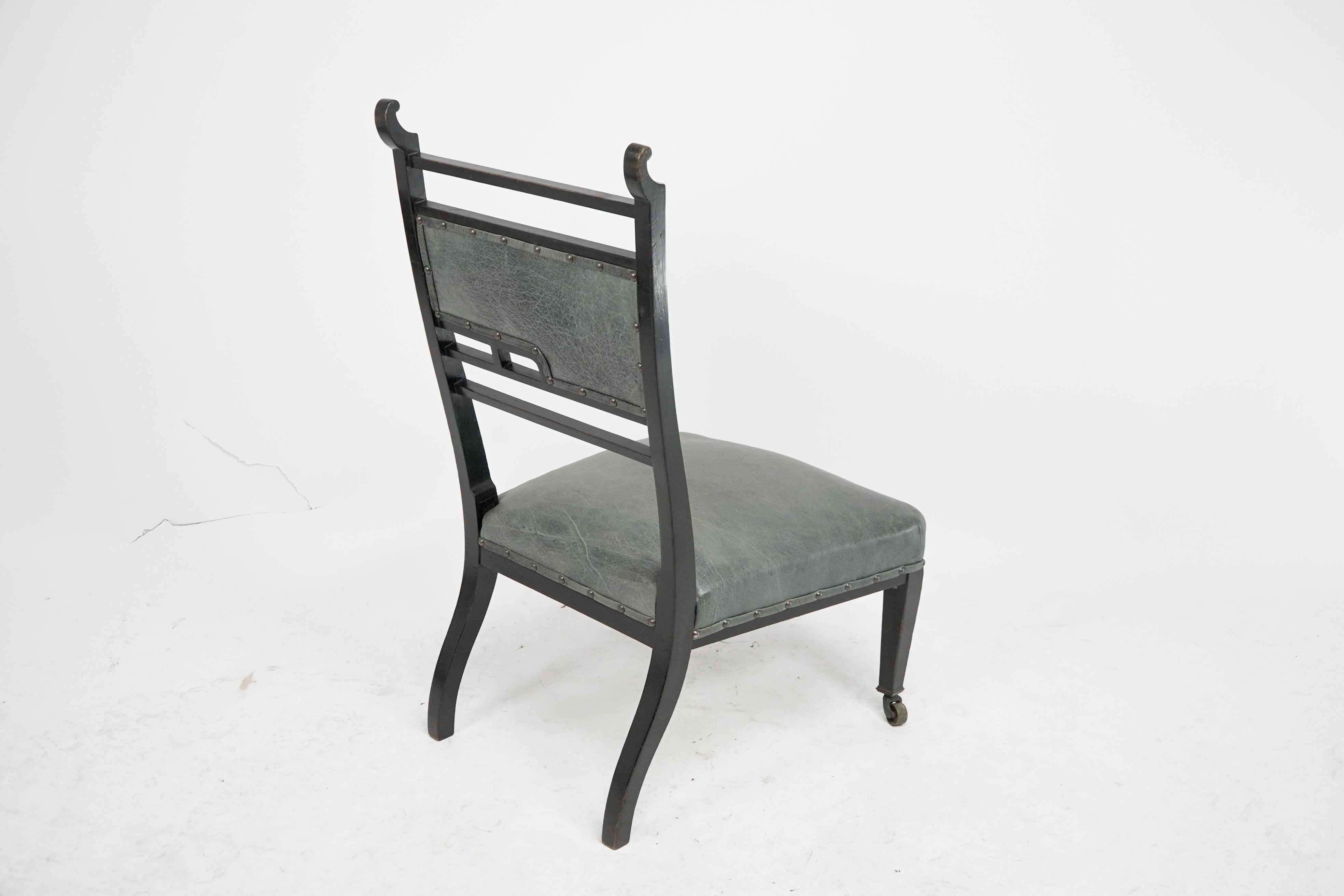 An Anglo-Japanese ebonized side or nursing chair with green hide upholstery For Sale 11