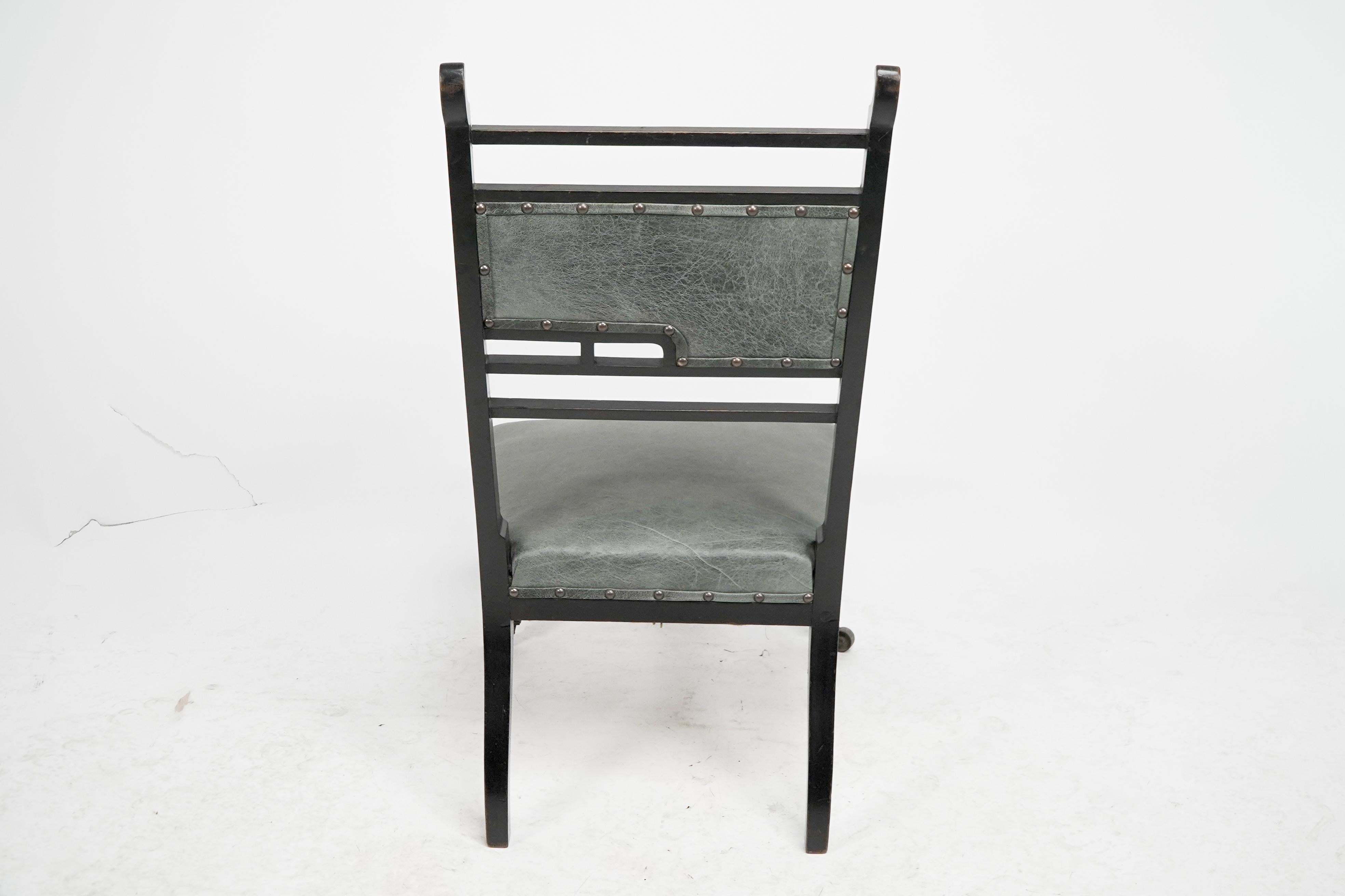 An Anglo-Japanese ebonized side or nursing chair with green hide upholstery For Sale 12