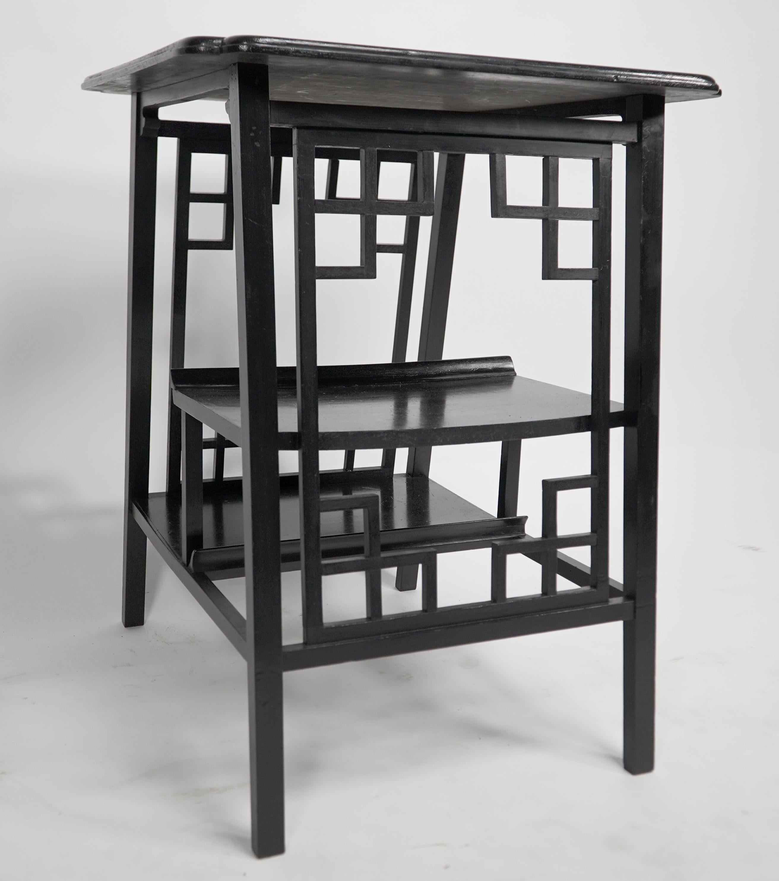 Late 19th Century A Scottish Anglo-Japanese ebonized side table with fretwork & hand carved edges. For Sale