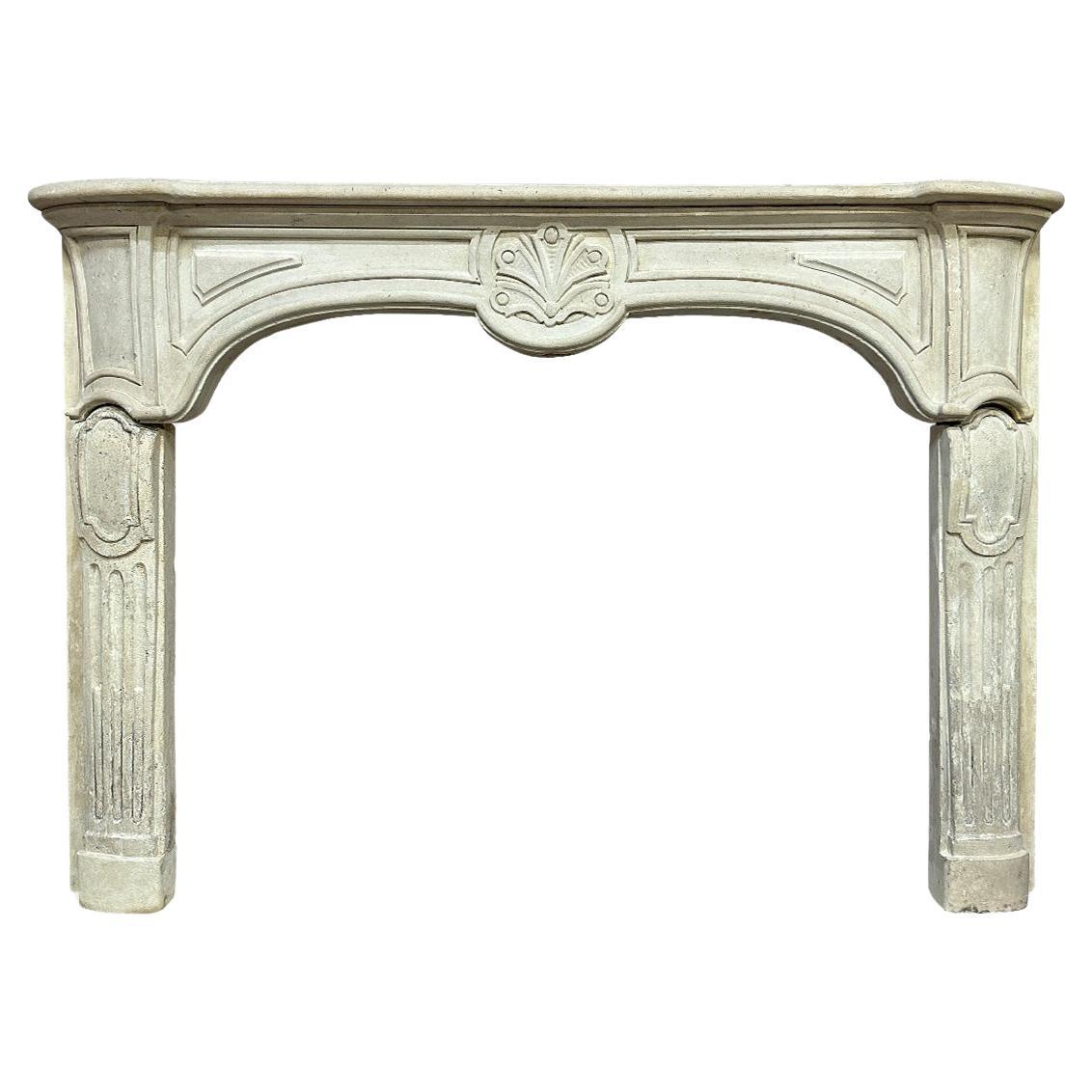 An Antique 18th century Provincial French Stone Fireplace Mantel  For Sale