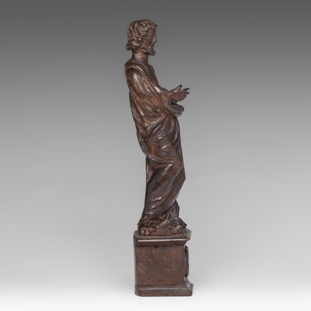 An antique 18th century Walnut European Santos - Saint figure on a plinth In Distressed Condition For Sale In Leesburg, VA