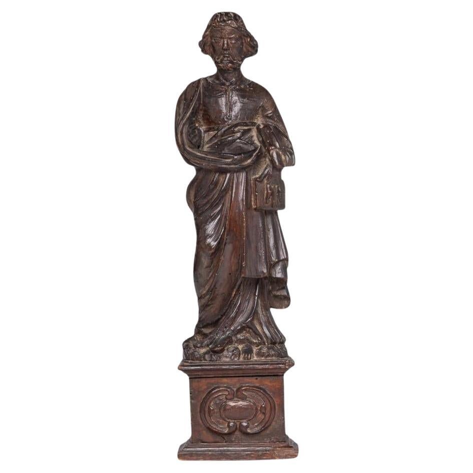 An antique 18th century Walnut European Santos - Saint figure on a plinth For Sale