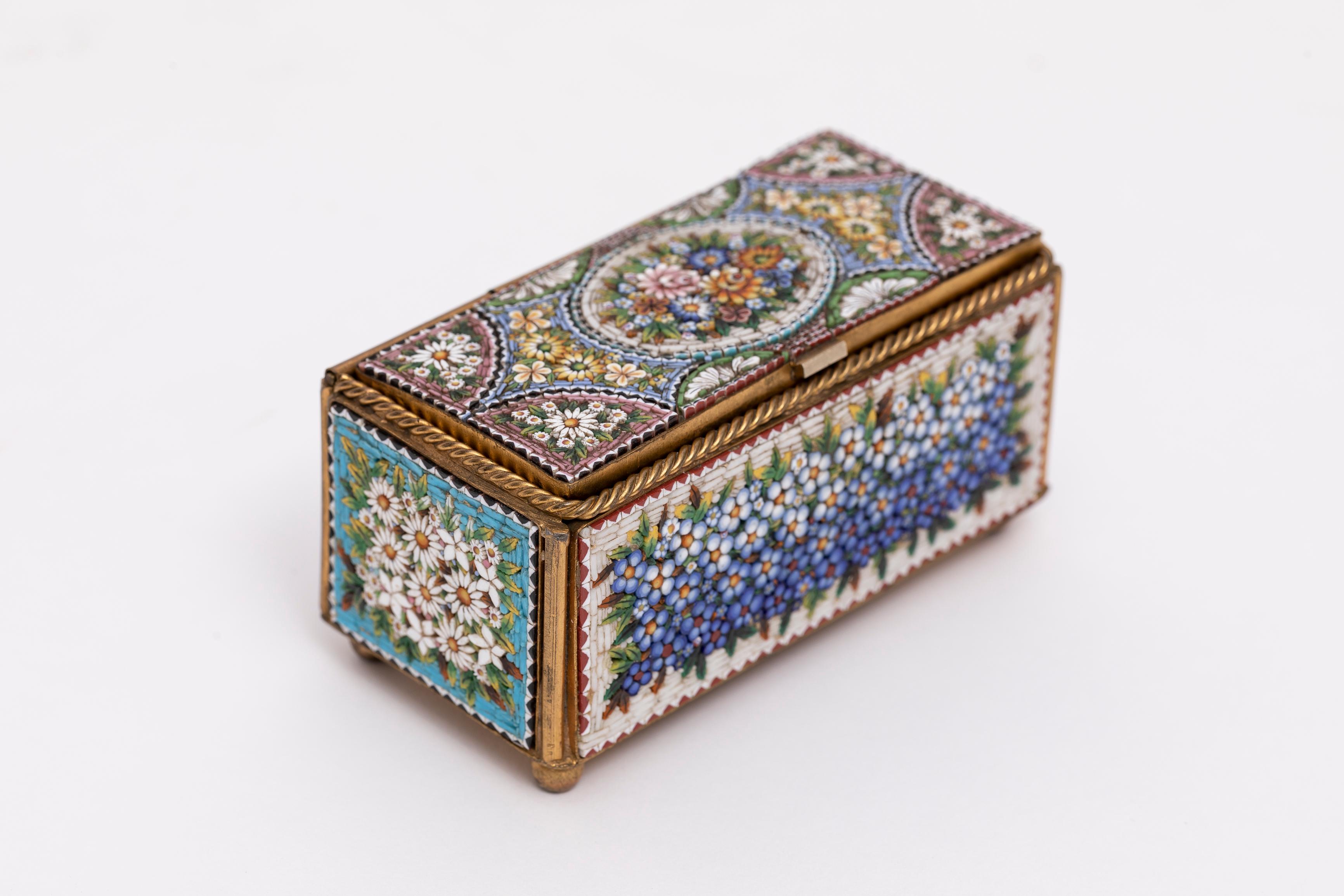 A Marvelous Antique 19th Century Italian Micro Mosaic Floral Motif Jewelry Box.  Step back in time with this exquisite Italian micro mosaic jewelry box dating back to 1880. Crafted with meticulous attention to detail, this gorgeous dore bronze